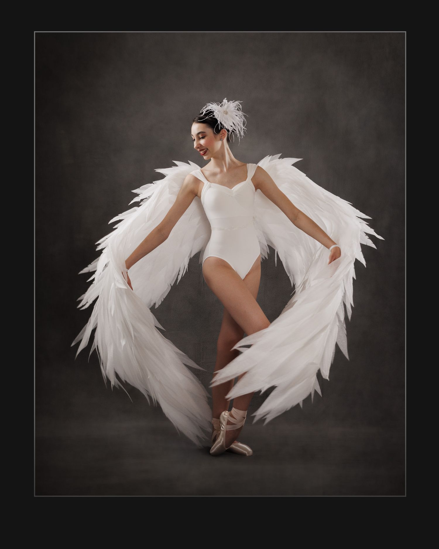 Portrait of dancer with wings emphasizing grace