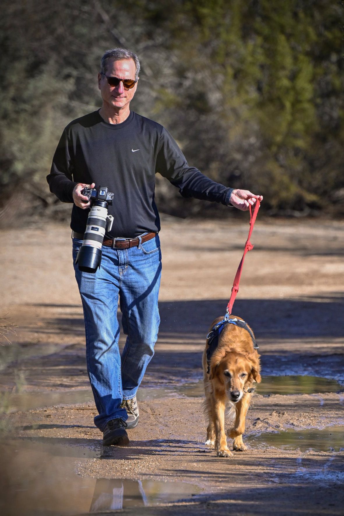 Tom and his best friend Abby enjoy a walk