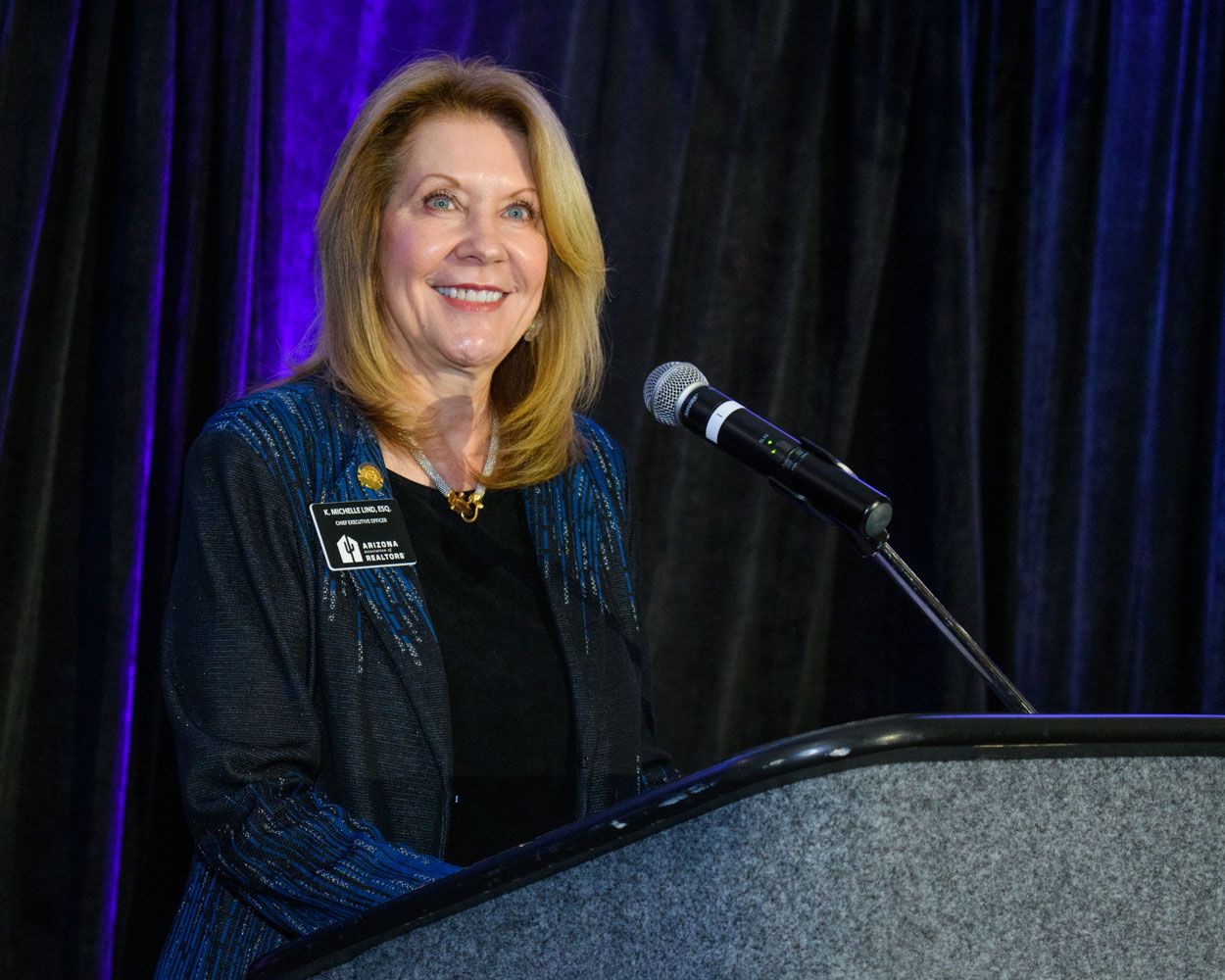 Award ceremony event photography with speaker on stage