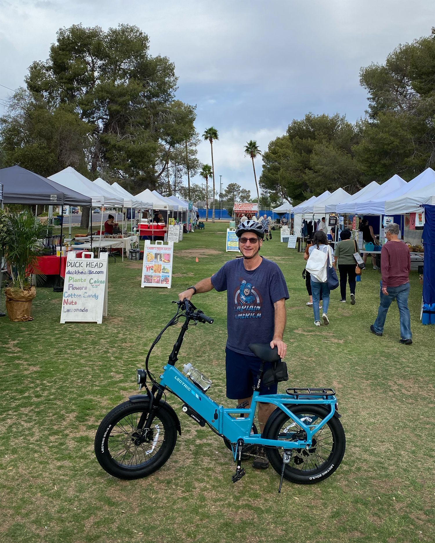 Tom at the farmers market with his Lectric XP bike
