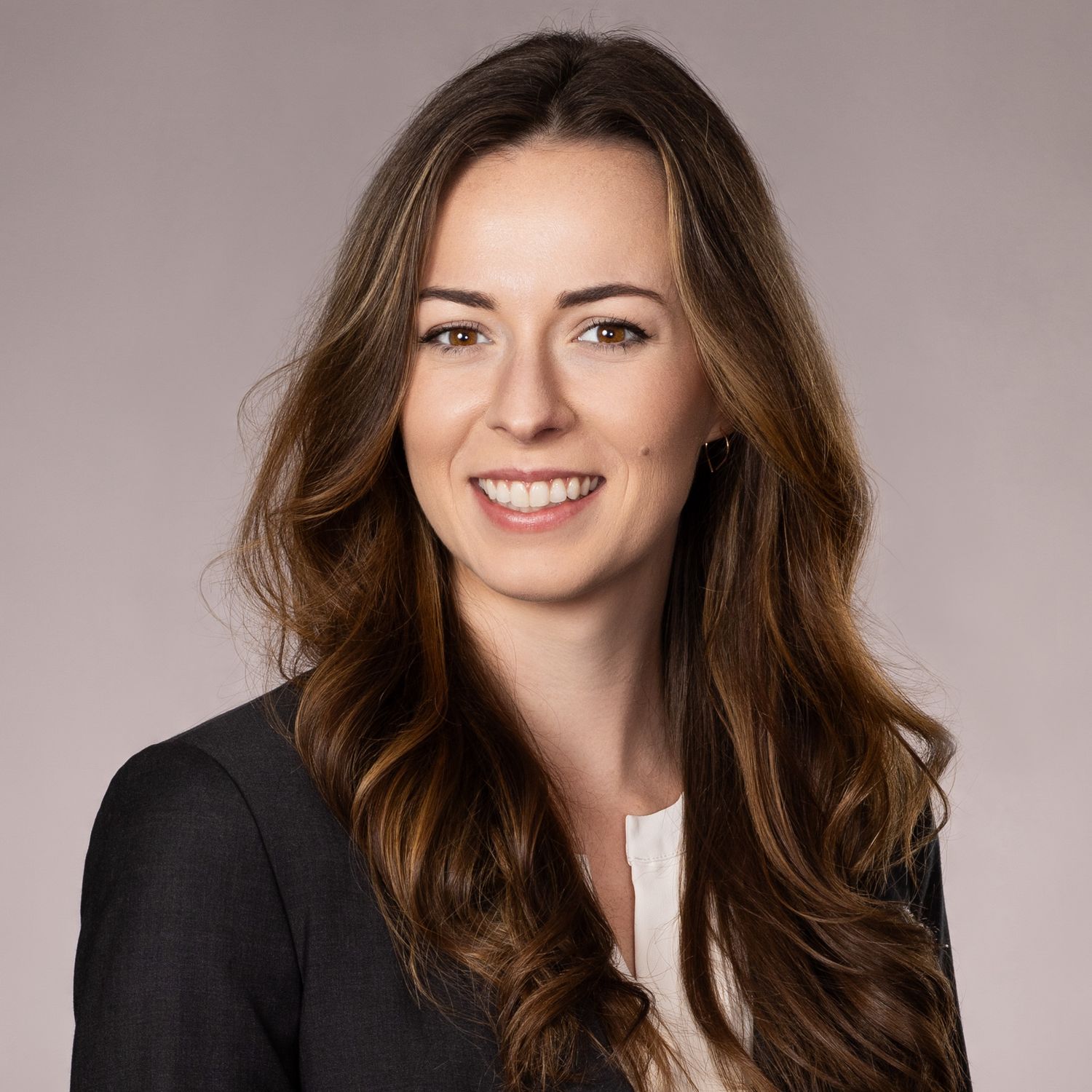 Close-up headshot of an attorney showcasing confidence