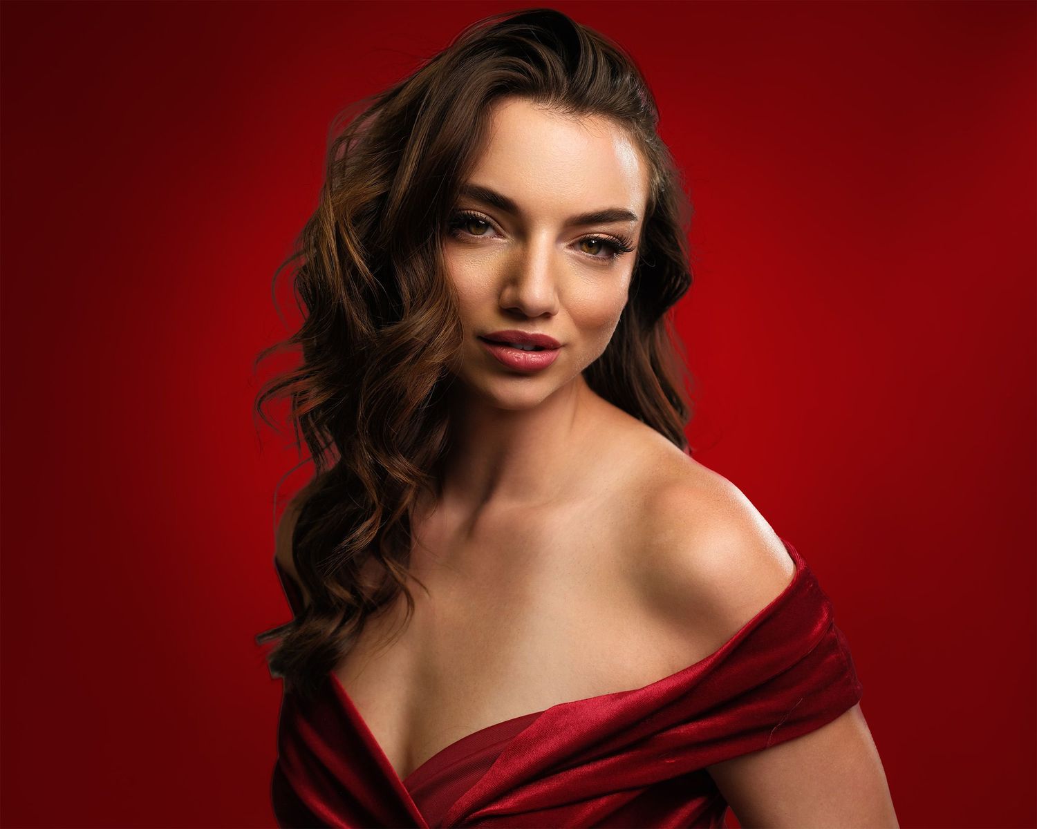 Creative headshot of model with a sultry expression