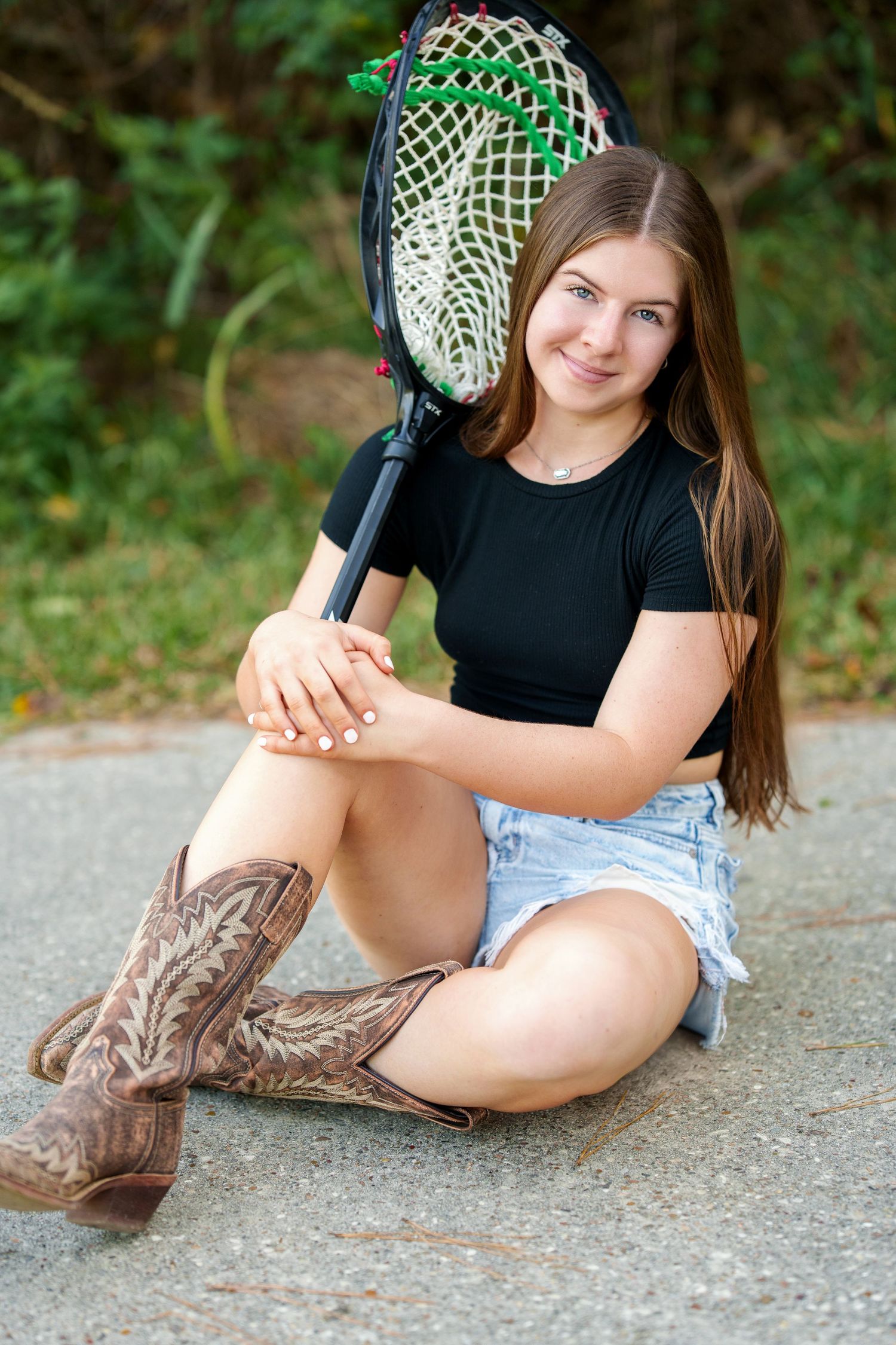 the woodlands lacross senior photos.  goalie net senior photos.