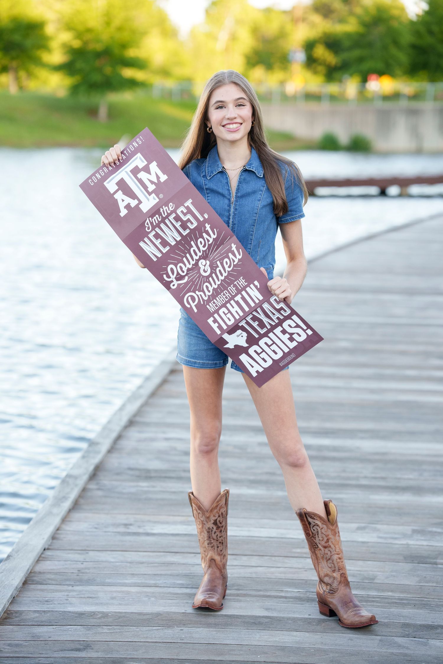 A&M college reveal images.  Posing with college gear for senior photos.  The woodlands senior photographer college session