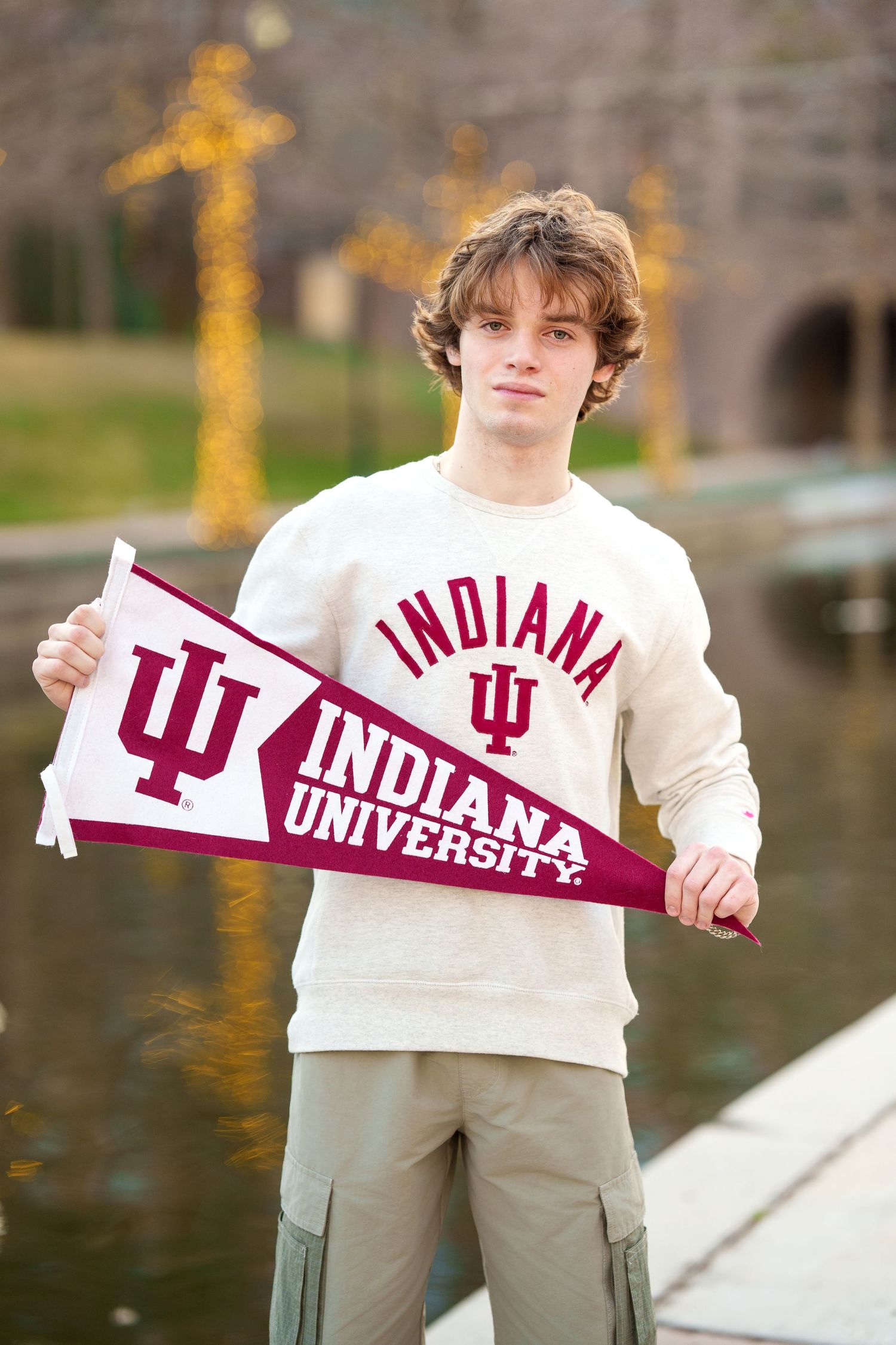 college reveal images.  Posing with college gear for senior photos.  The woodlands senior photographer college session