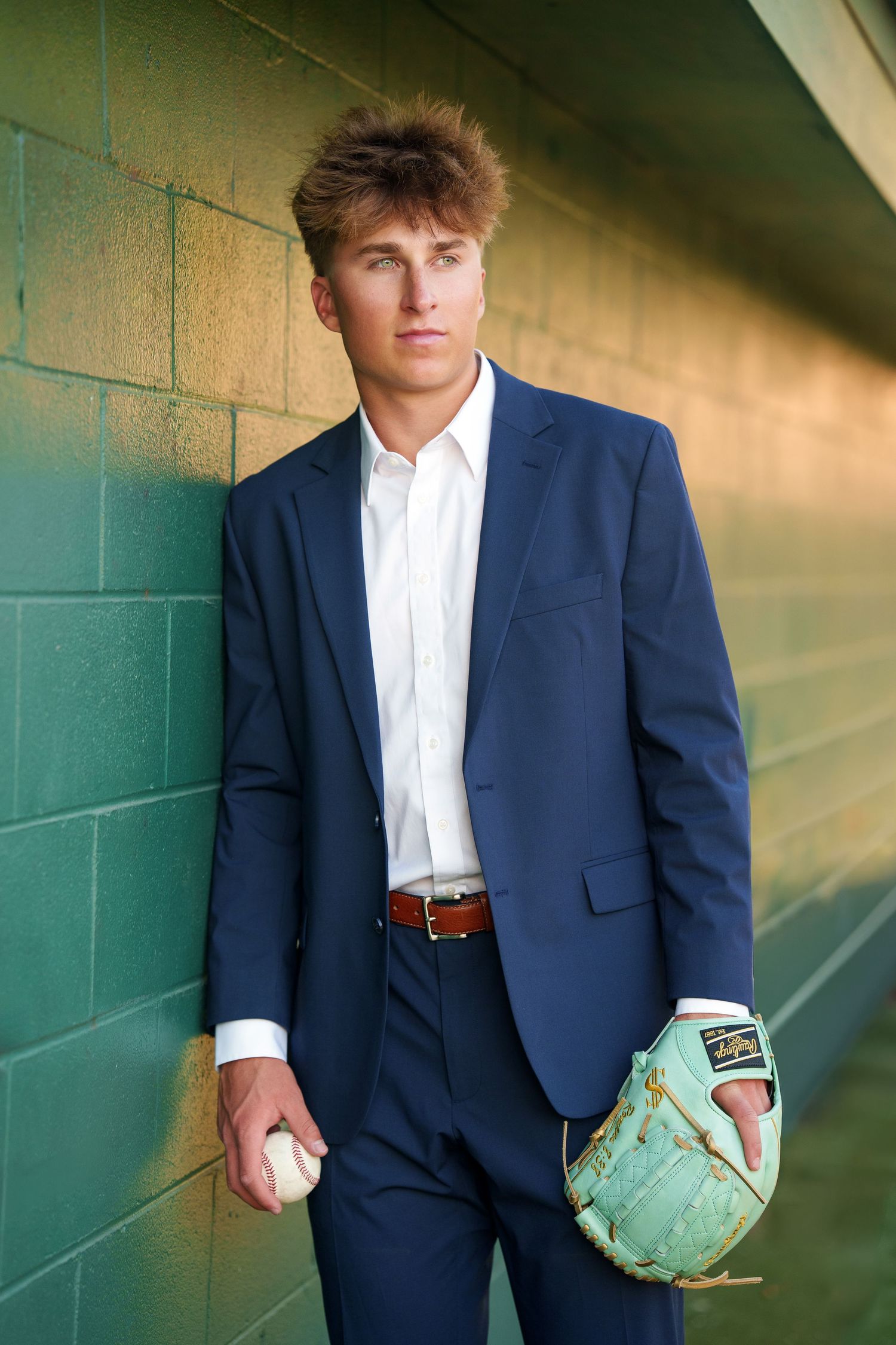 the woodlands senior photographer.  Baseball field images.  senior photos in the woodlands baseball.  pitcher senior photos.  dugout