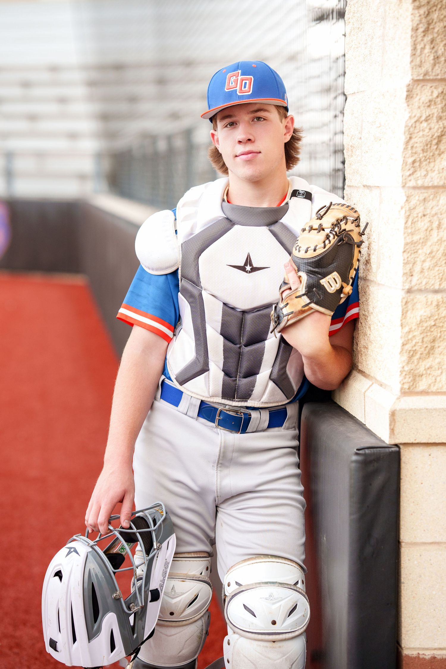 the woodlands senior photographer.  Baseball field images.  senior photos in the woodlands baseball.  Grand oaks catcher senior photos.