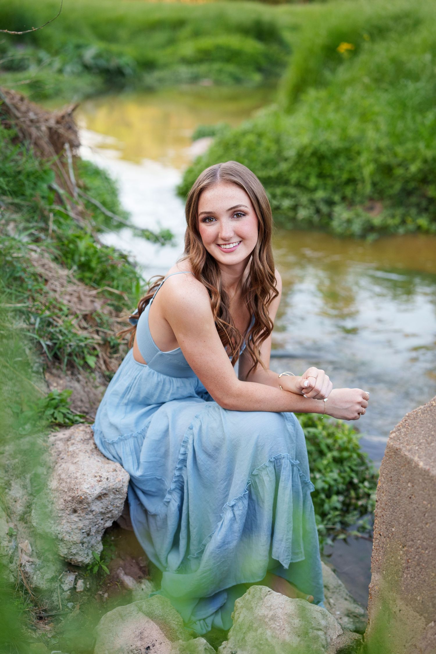 senior girl at a creek