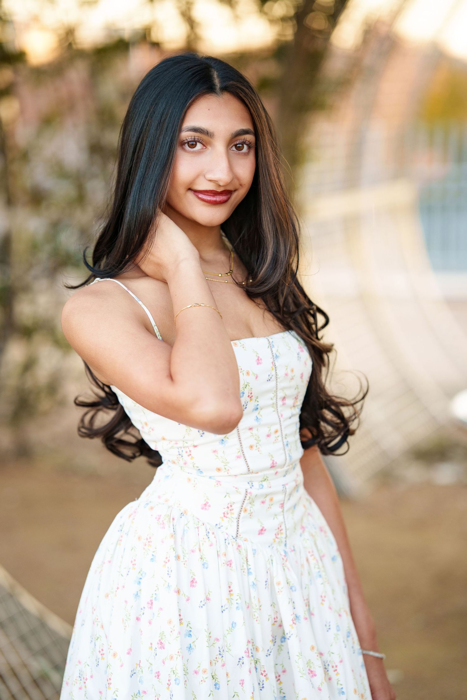 houston senior photos in a park.  the woodlands senior photographer with a girl in a short dress