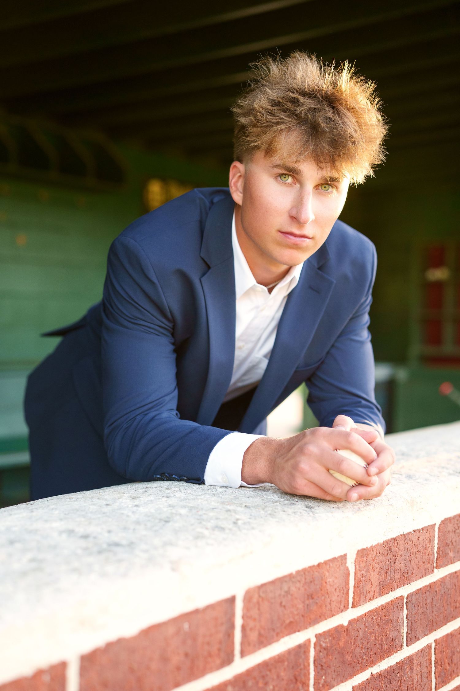 the woodlands senior photographer.  Baseball field images.  senior photos in the woodlands baseball.  pitcher senior photos.  dugout