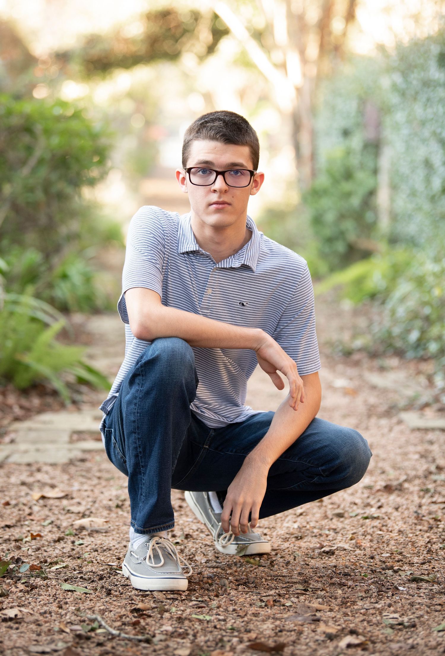 nature senior photos for boys in the Woodlands