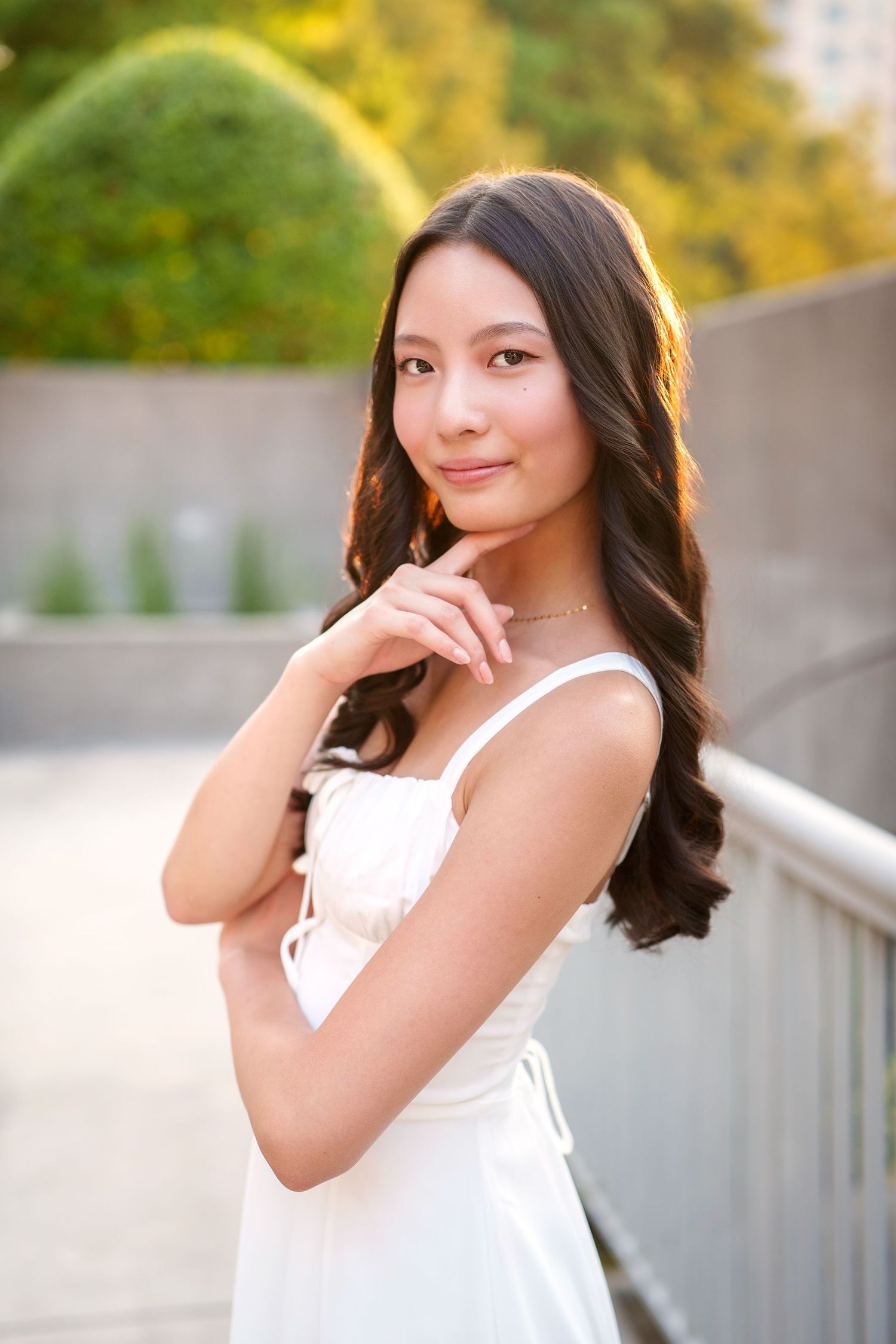 Garden senior photos in the woodlands.  Woodlands senior photographer.  Best time for senior photos is golden hour for a golden glow