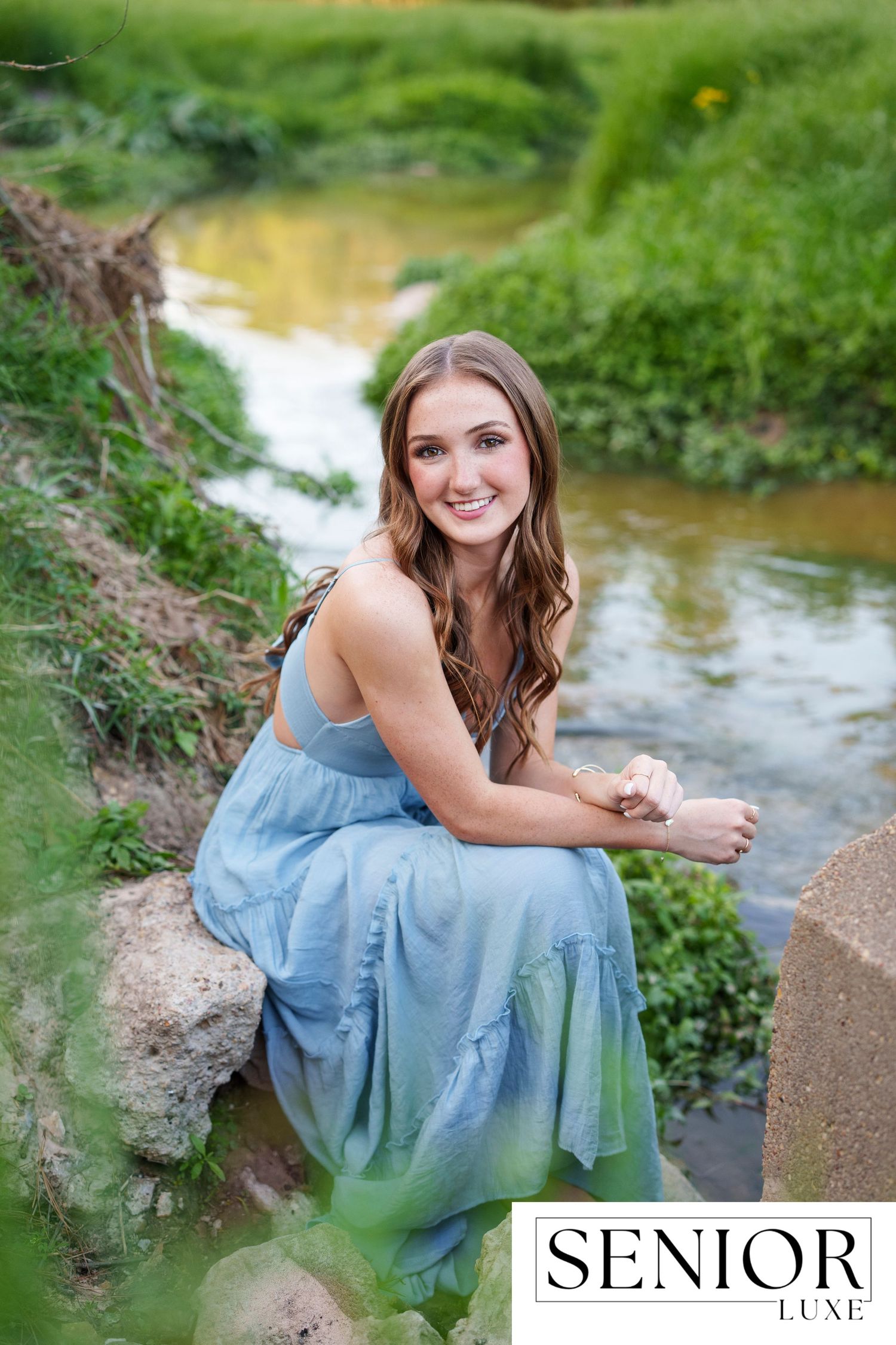 The Woodlands senior photographer.  Senior girl creek photos.  field photos for senior girls