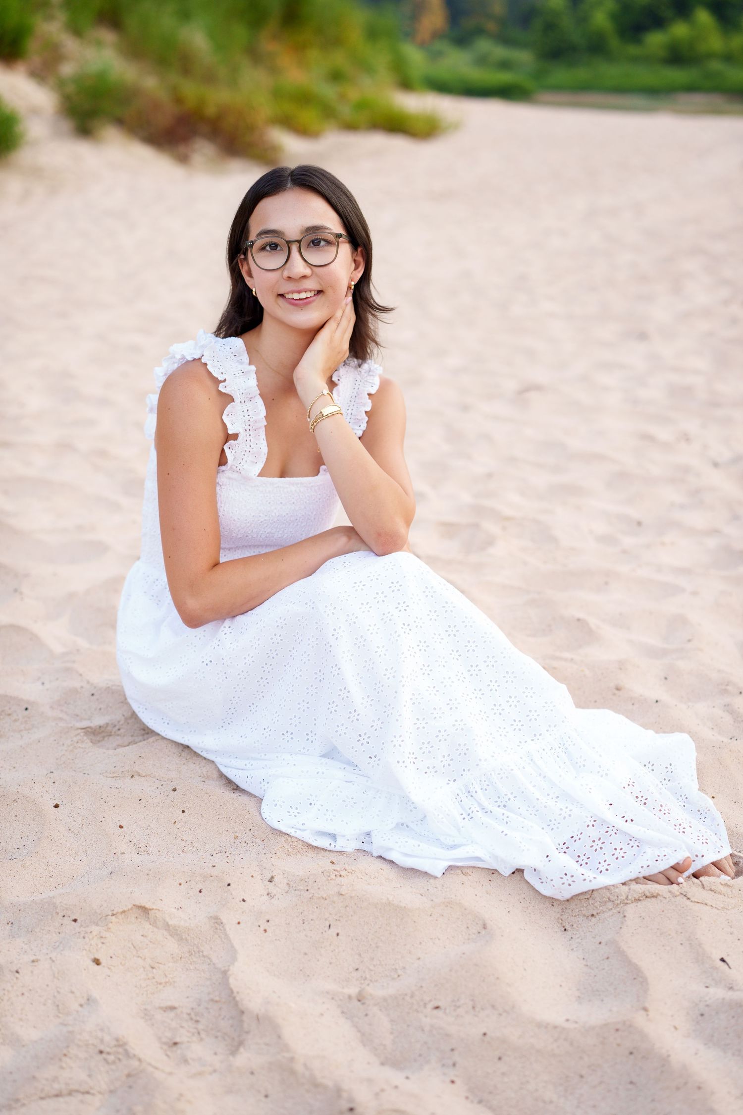 beach sand senior photos near the Woodlands.  white dress