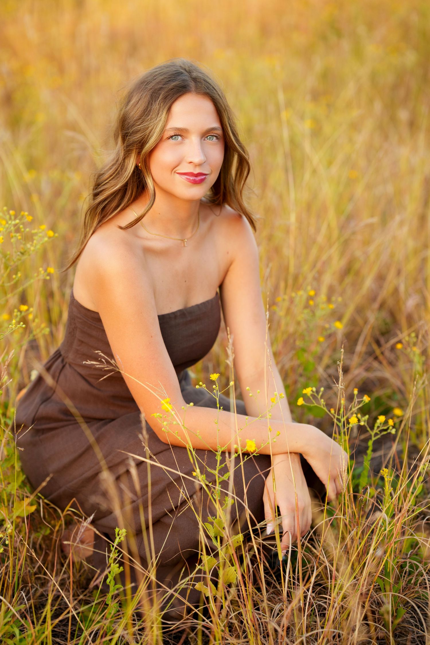 The Woodlands senior photographer.  senior pictures in fall in the tall grass