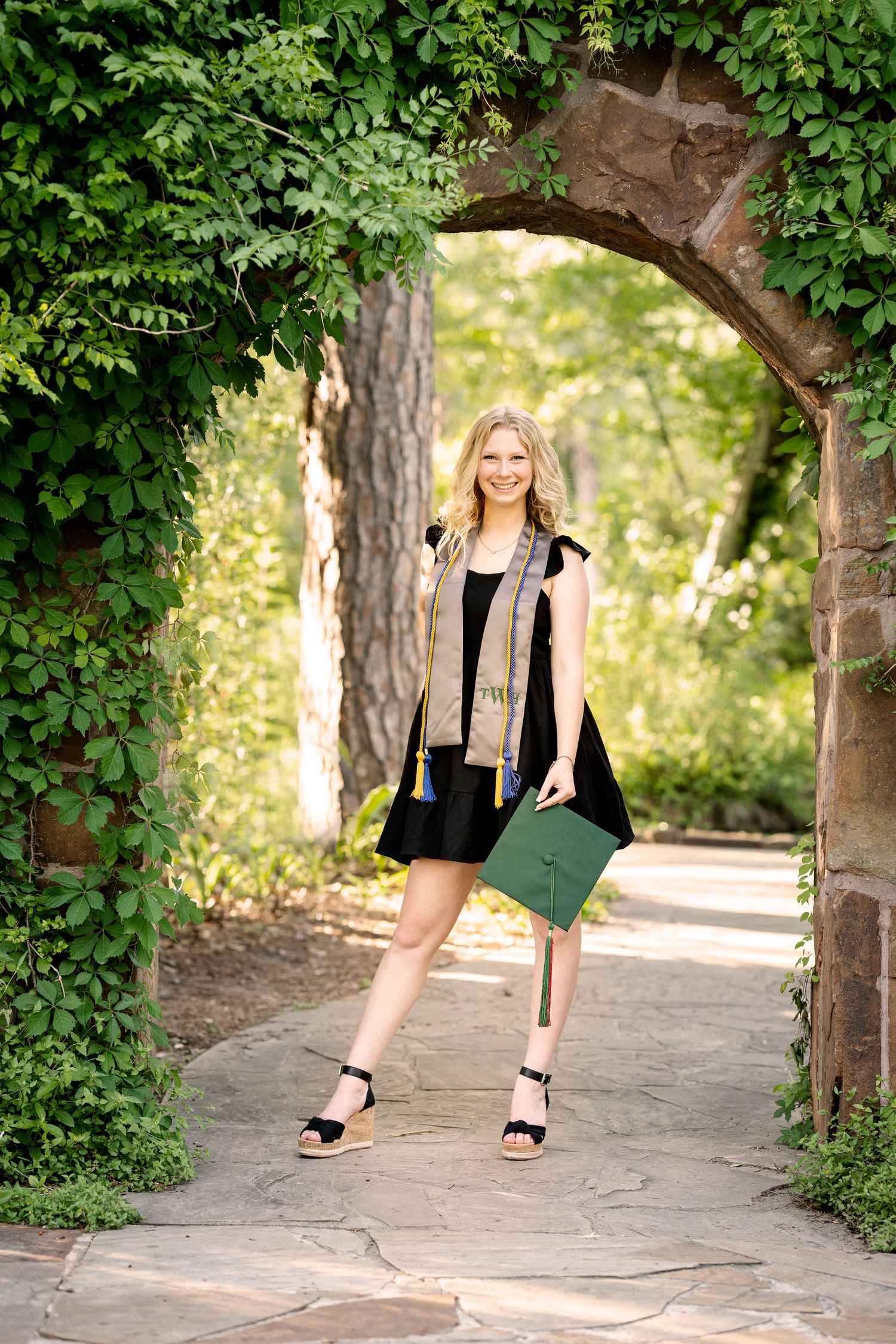 The Woodlands senior photographer garden and ivy cap and gown photo