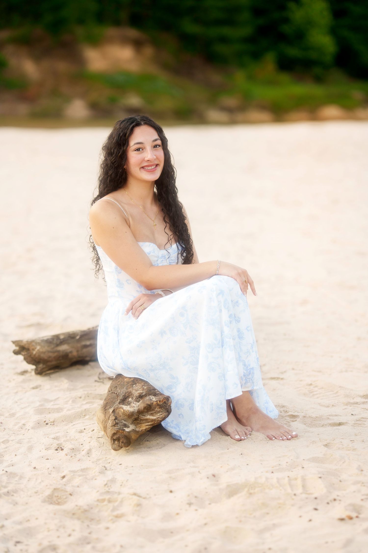 senior girl on a sandy creek.  senior photos in the woodlands.  beach senior photos in houston.