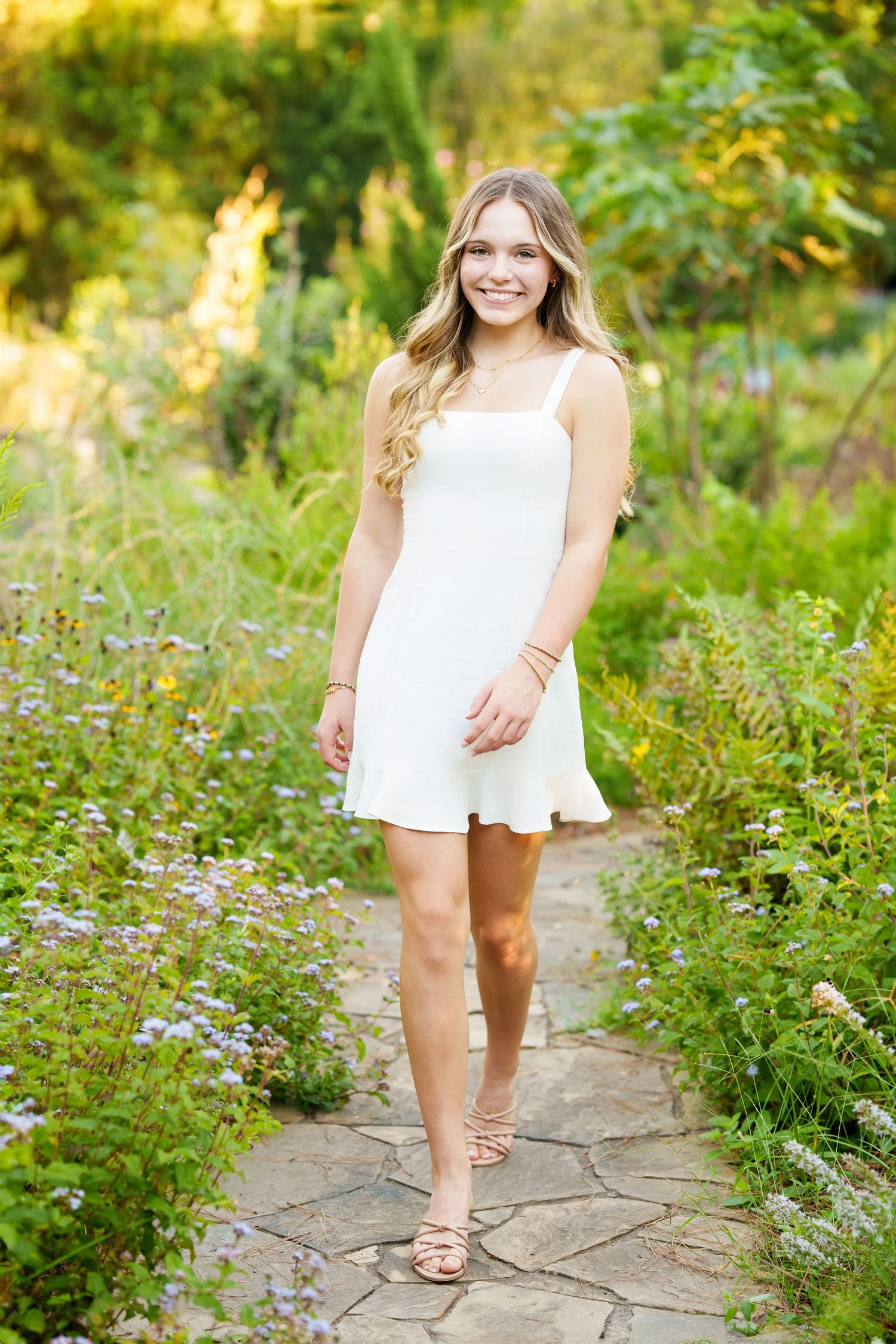 senior girl in Spring garden