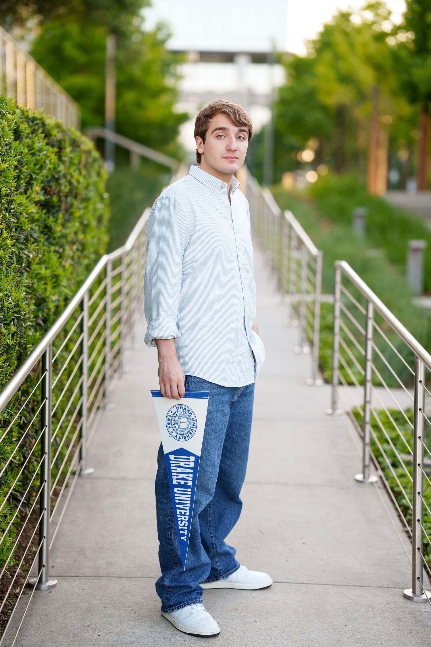 senior guy with college pennant