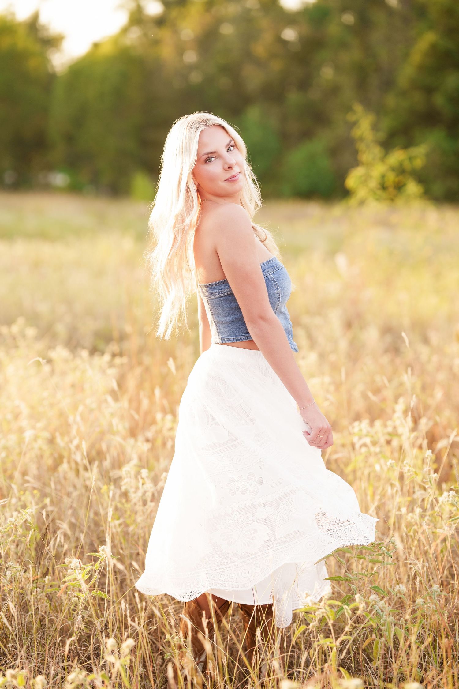 The Woodlands senior photographer.  Tall dry grass senior photos