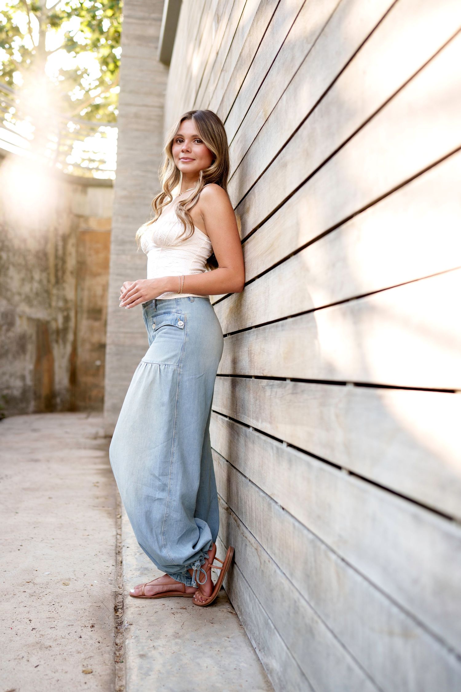 senior photographer in houston.  urban senior girl session.  girl wearing jeans for senior photos.