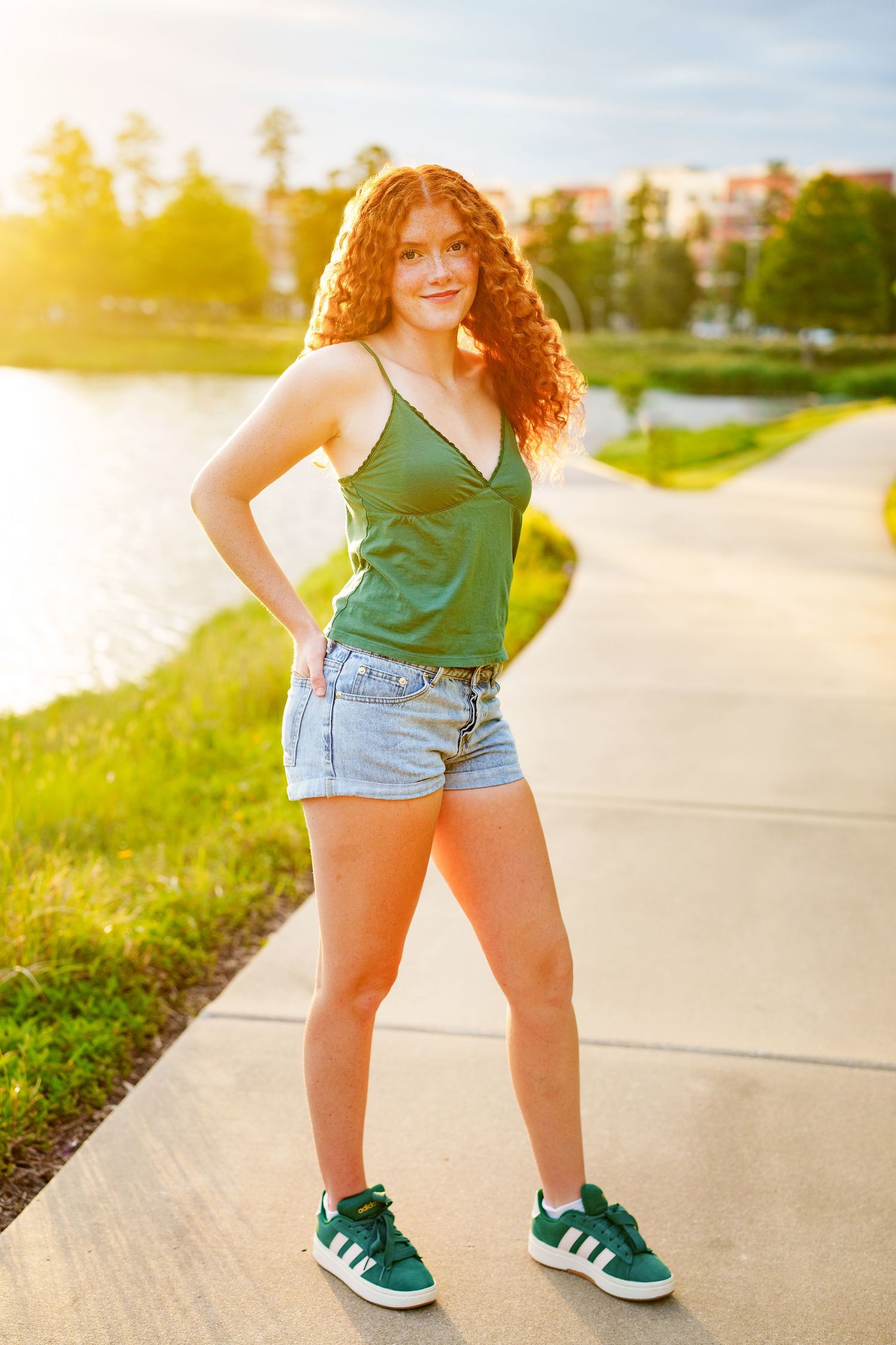 casual sneakers for a senior photo in the woodlands.