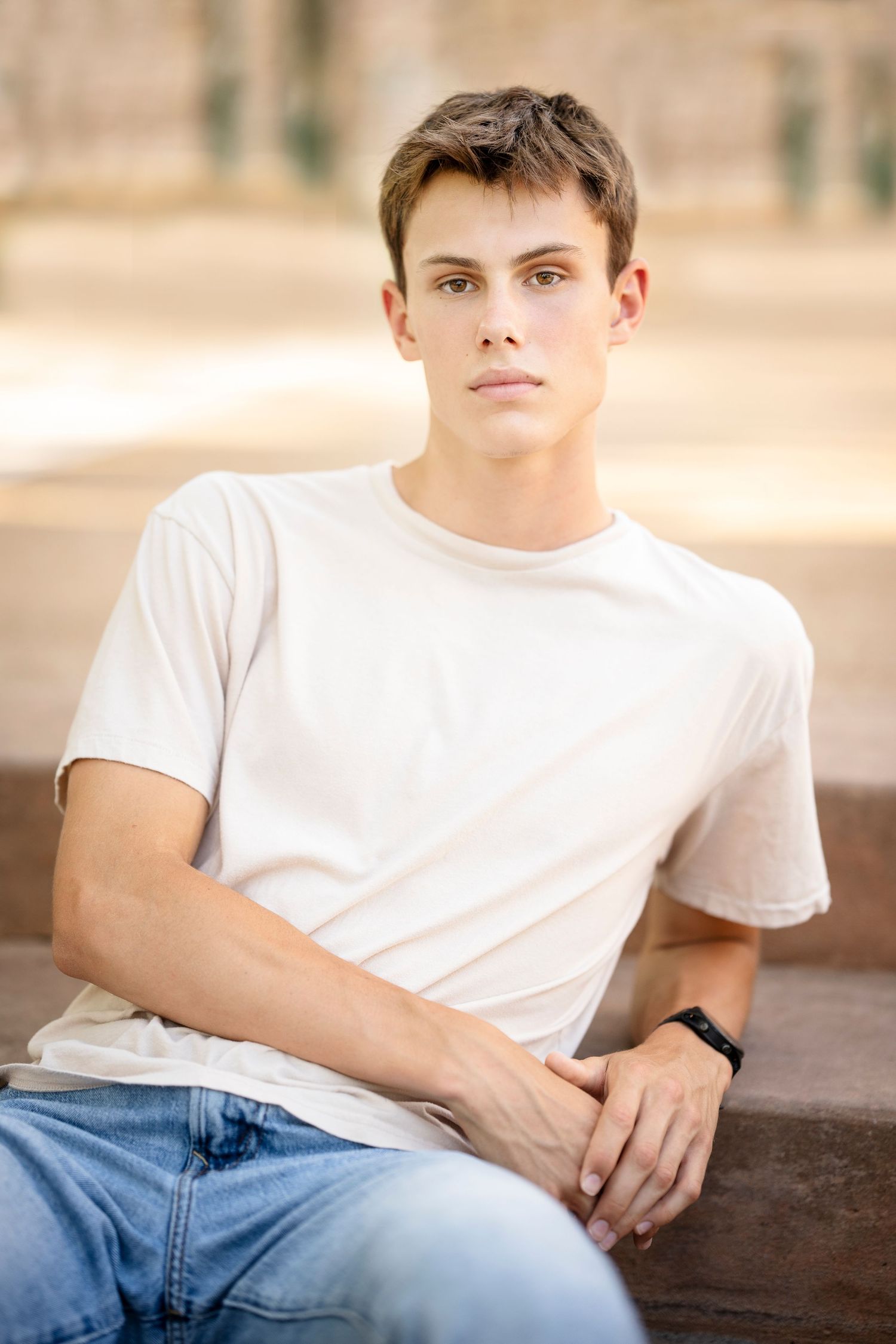 senior guy chilling on stairs