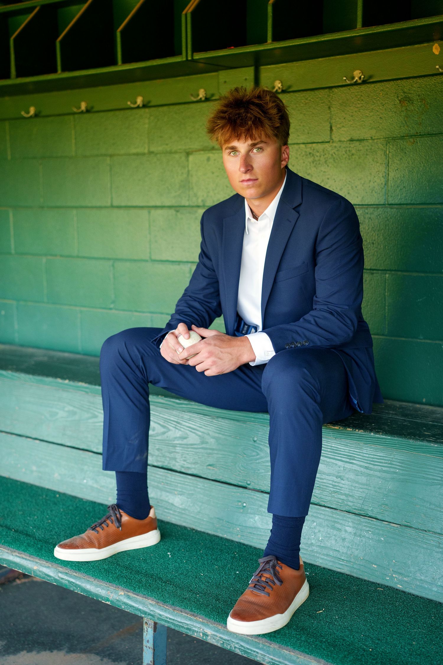 the woodlands senior photographer.  Baseball field images.  senior photos in the woodlands baseball.  pitcher senior photos.  dugout