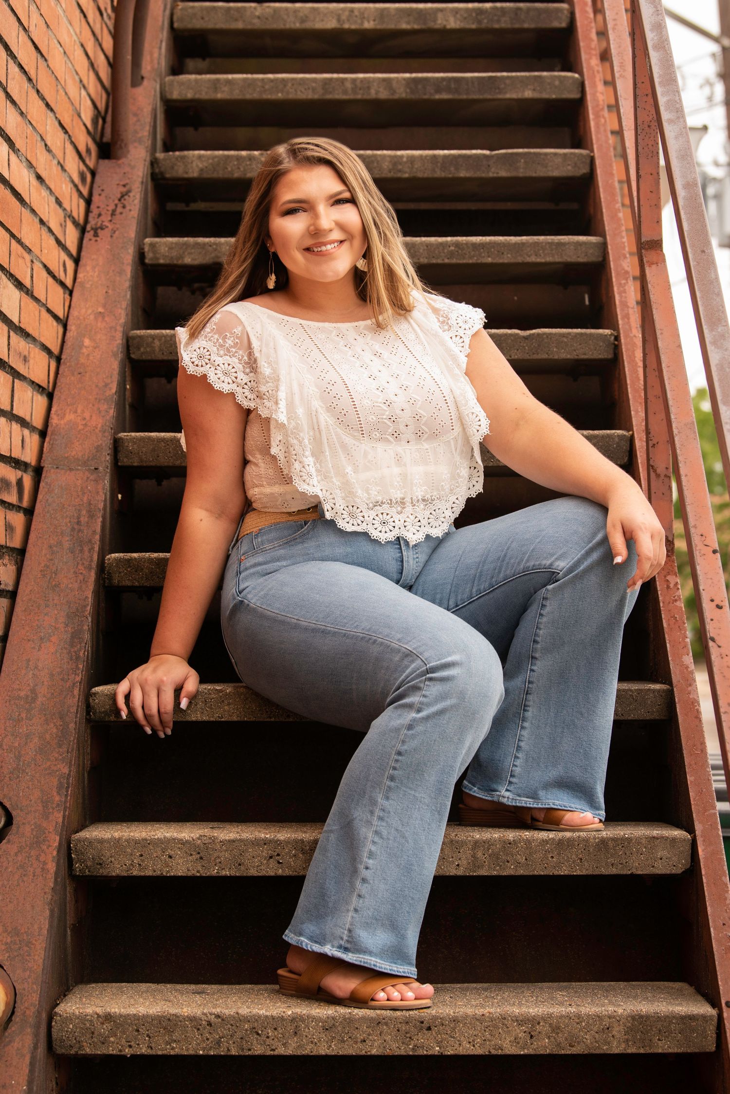 urban senior girl on alley stairs