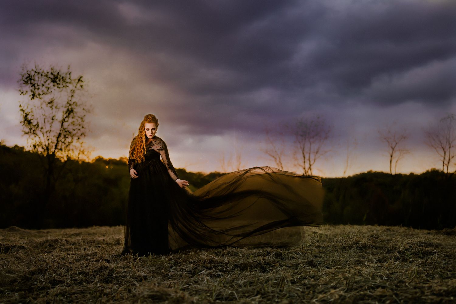Moody golden-hour portrait of a woman in flowing dress — fine art movement photography captured by ja’nicole;art  in Southeast Ohio.