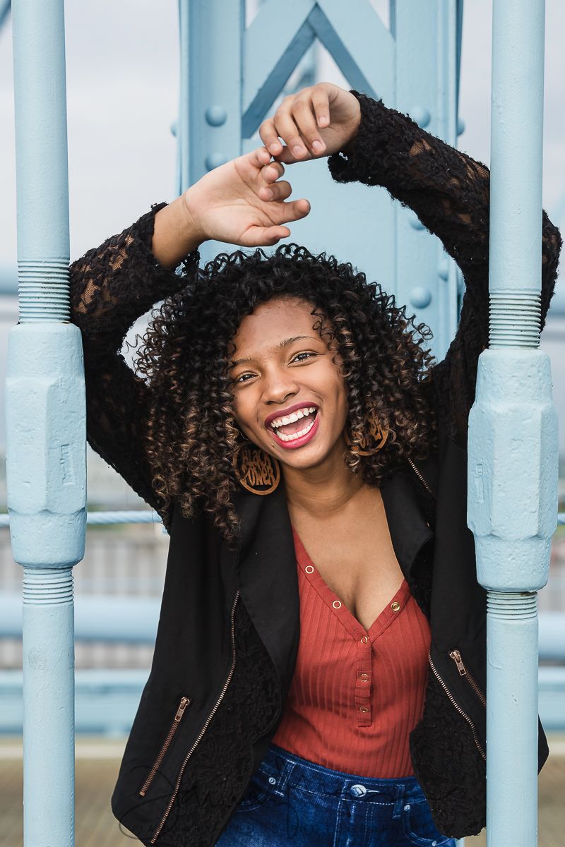 Woman smiling with hands raised above her head — joyful, expressive, modern portrait | Fine art portraiture by ja’nicole;art, Ohio