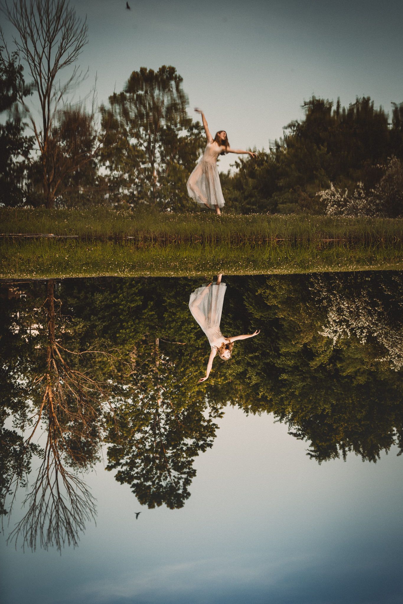 Dreamlike fine art reflection portrait captured by ja’nicole;art in Southeast Ohio — stillness and symmetry between earth and ether.