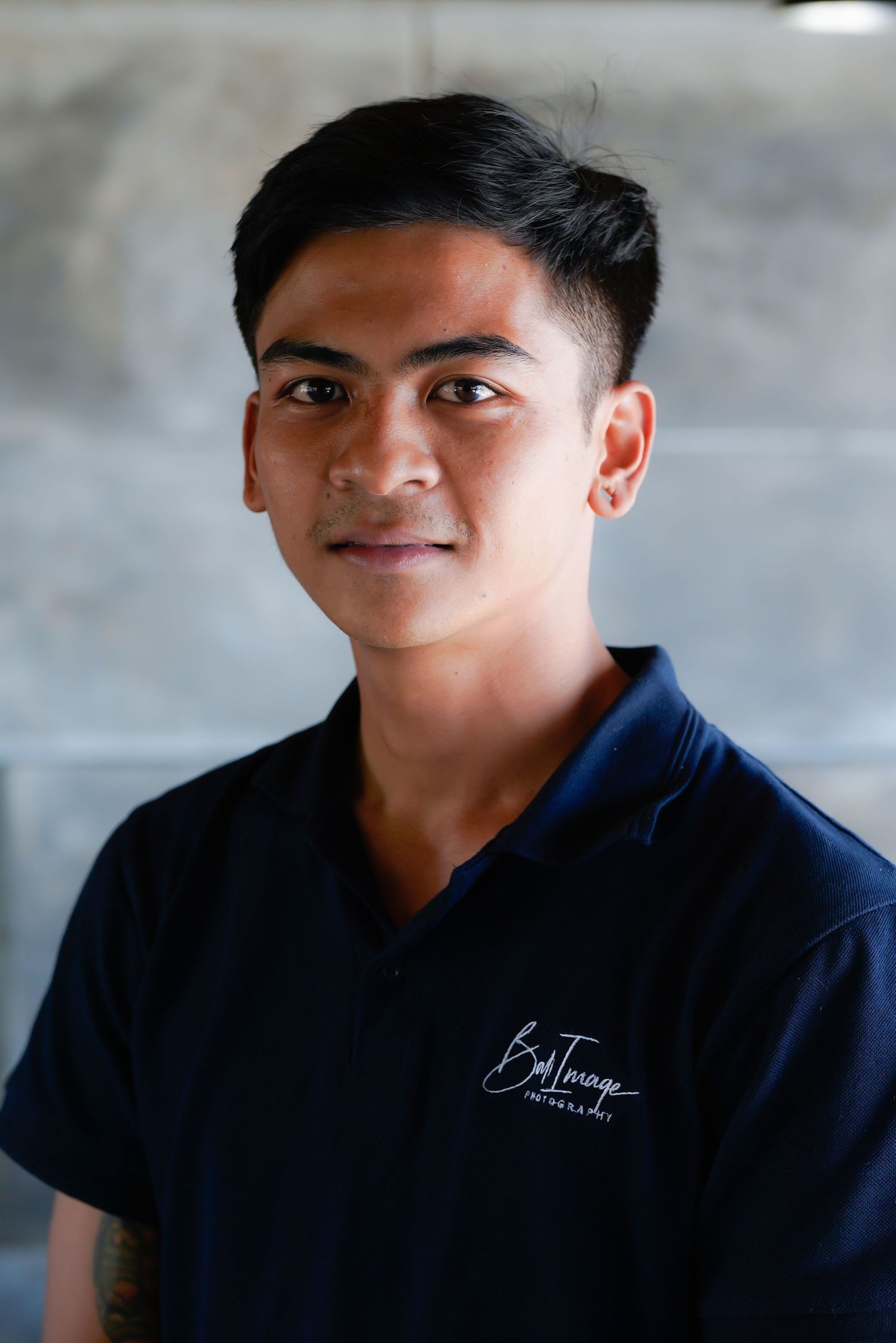 Multiple angle portraits showing confident poses in navy corporate attire.