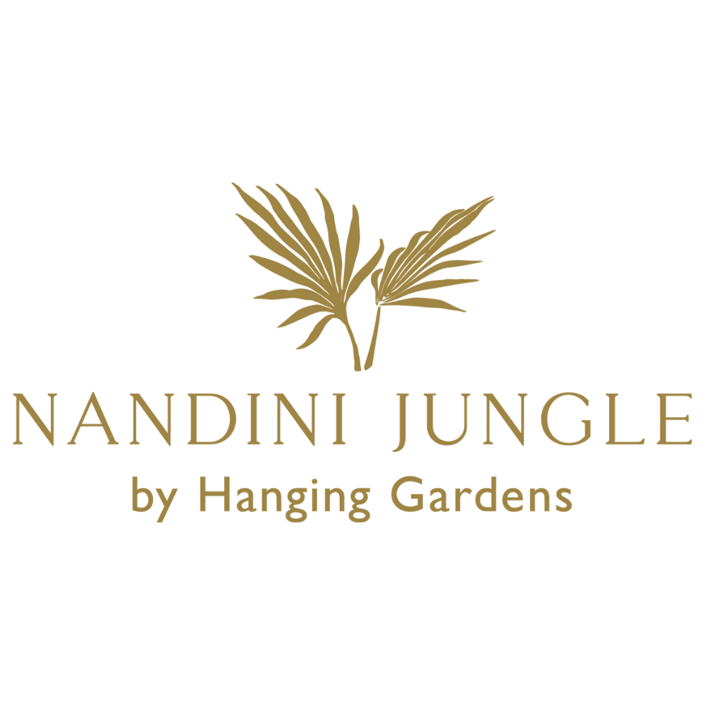 Gold palm leaf logo design for Nandini Jungle luxury resort brand.