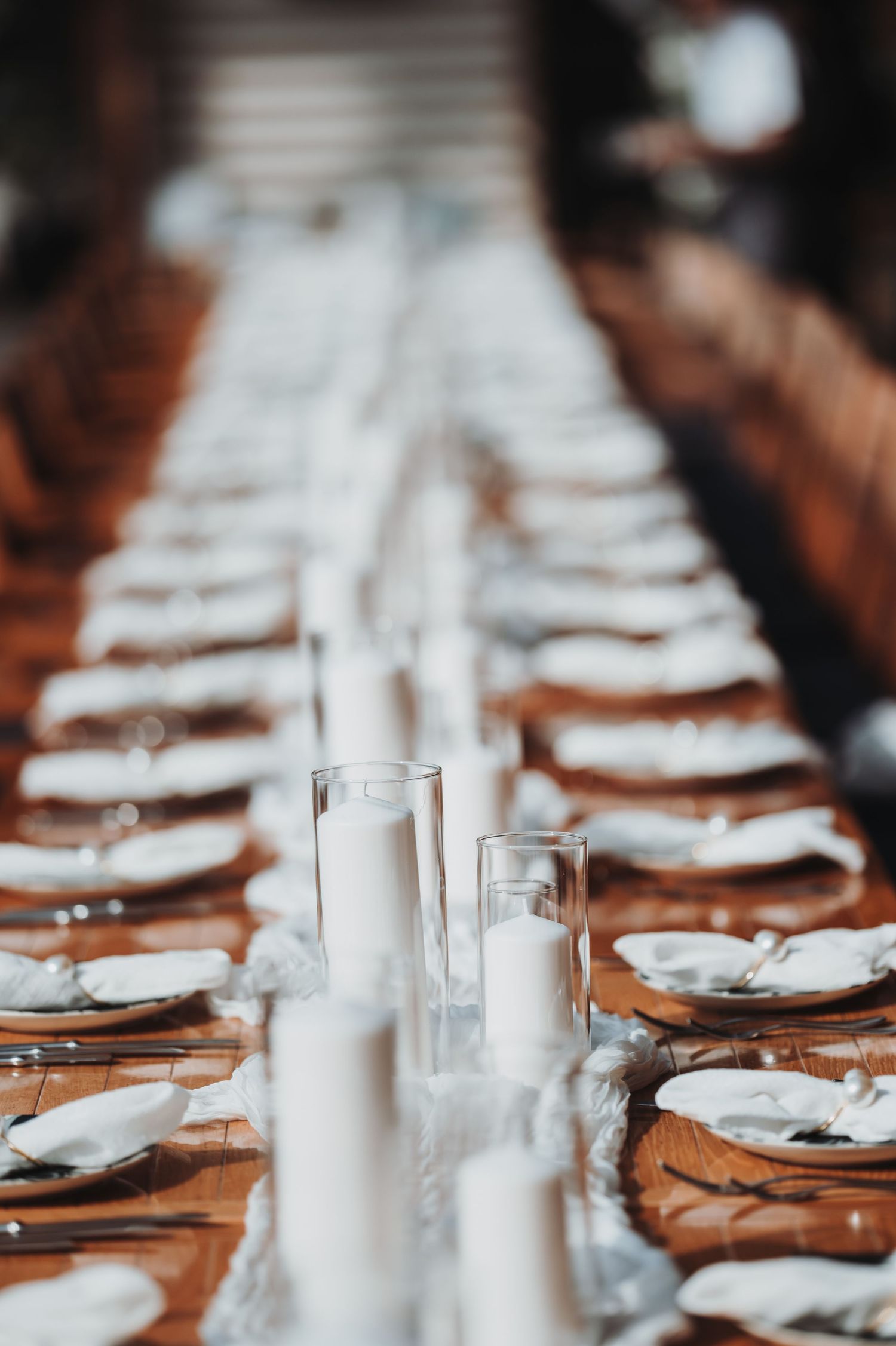 Elegant table setting with glassware and place settings at a formal event.