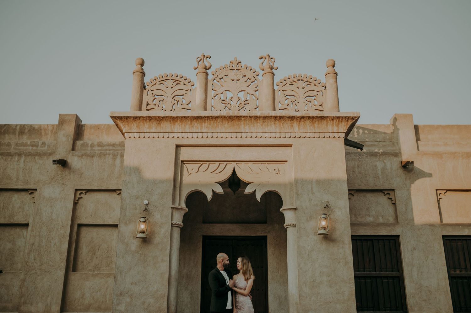 Historic Middle Eastern architecture with ornate details and arched doorways.