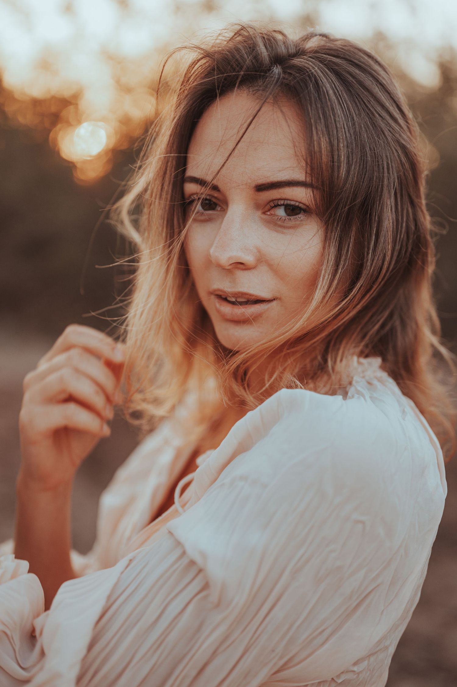 Candid portrait series with natural expressions in golden hour lighting.