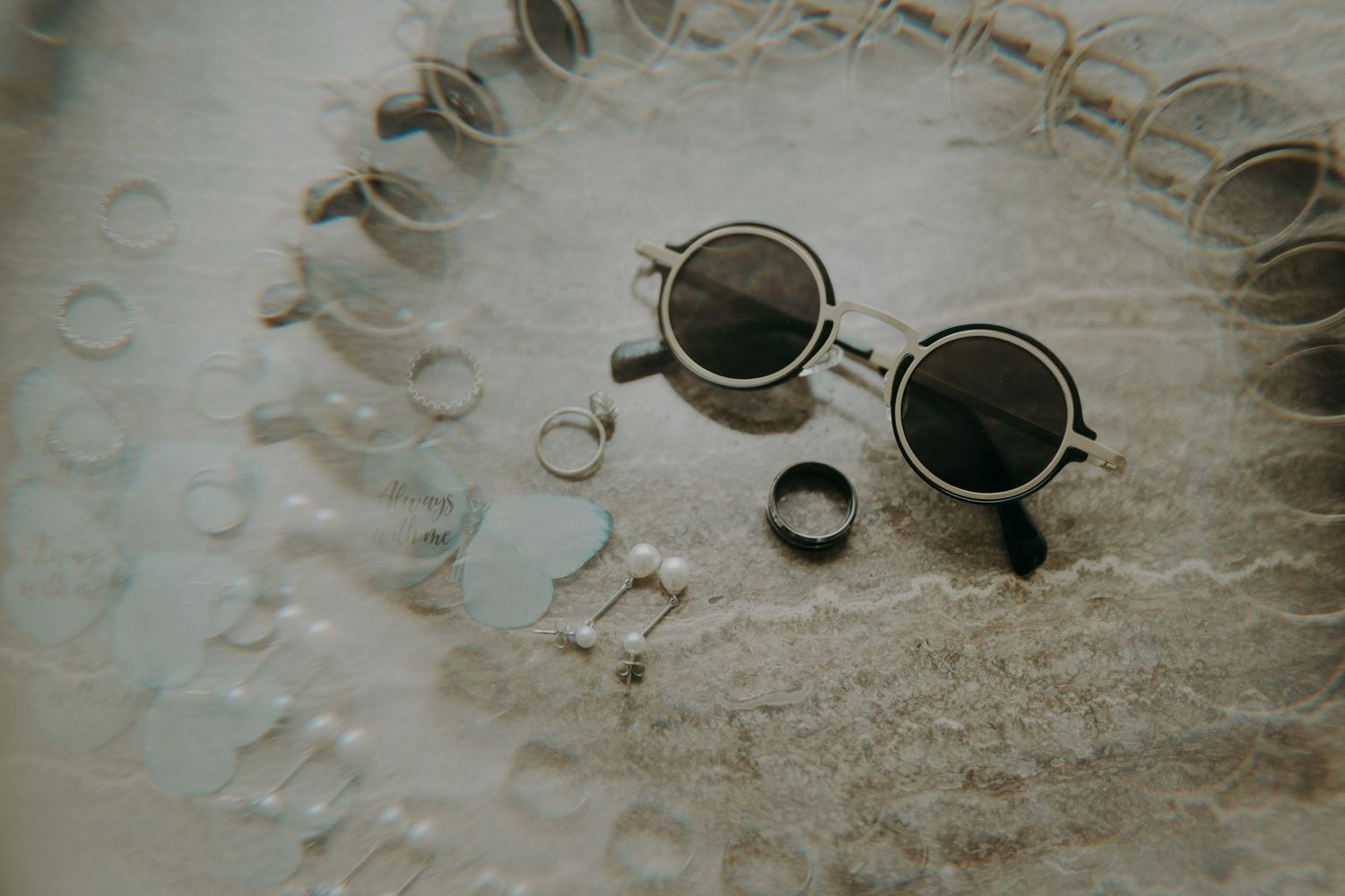 Sunglasses arranged in a stylish flat lay composition.