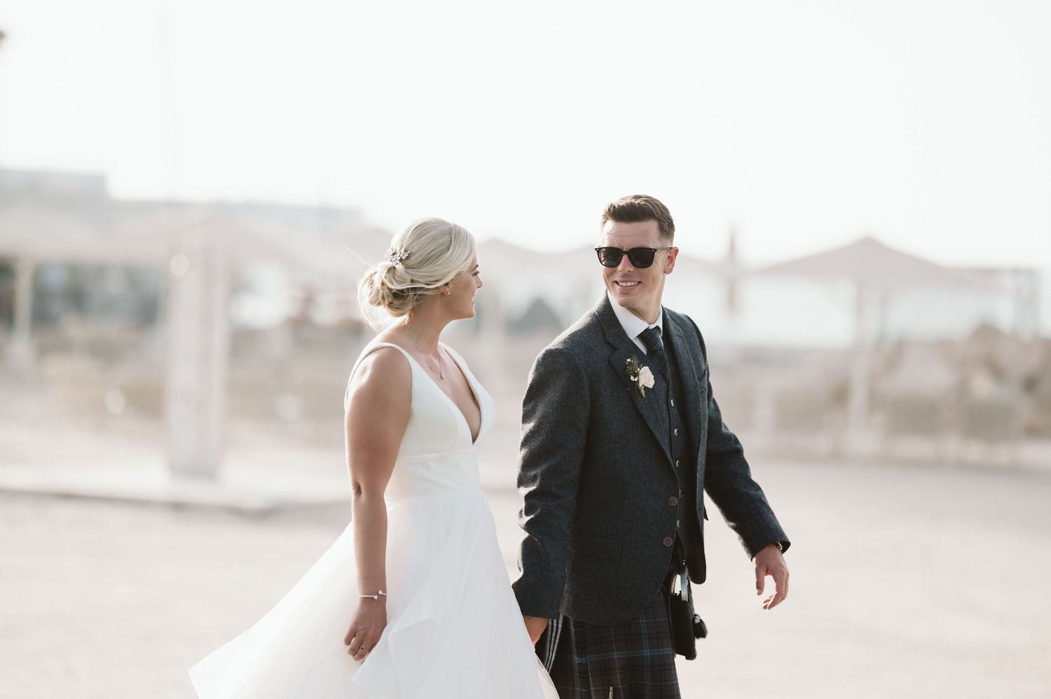 Desert wedding photography with bright natural lighting.