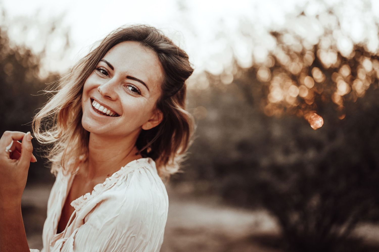 Sunset portrait with warm golden lighting and natural expressions.