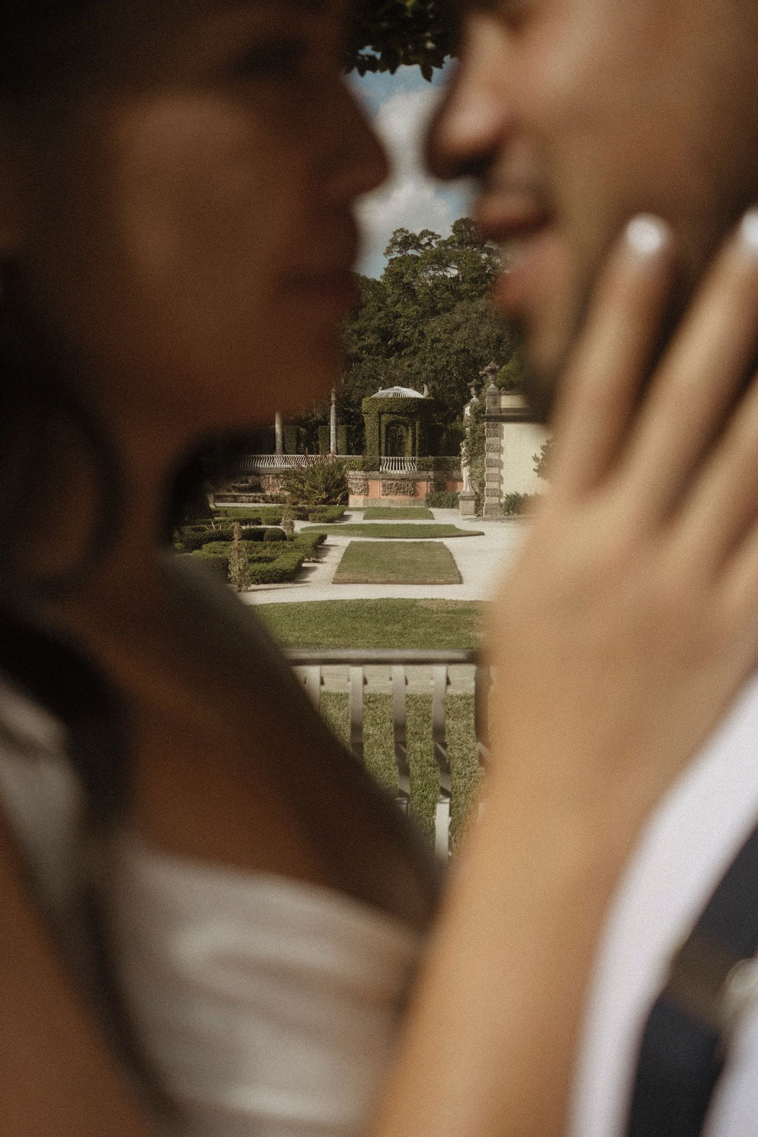 Close-up detail shots of a couple during an intimate outdoor wedding ceremony.