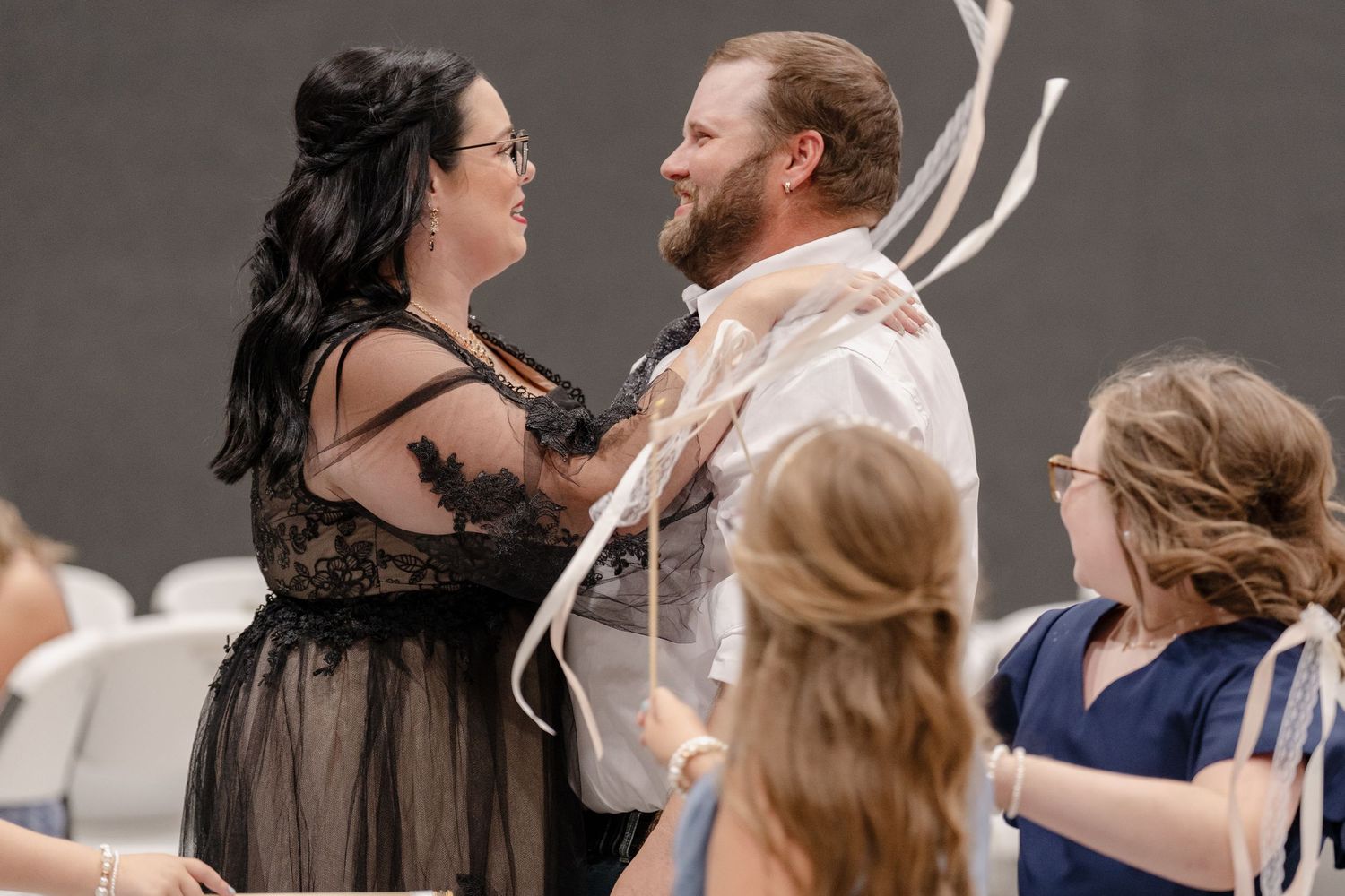 A couple dancing together in a romantic pose with elegant movement and graceful form.