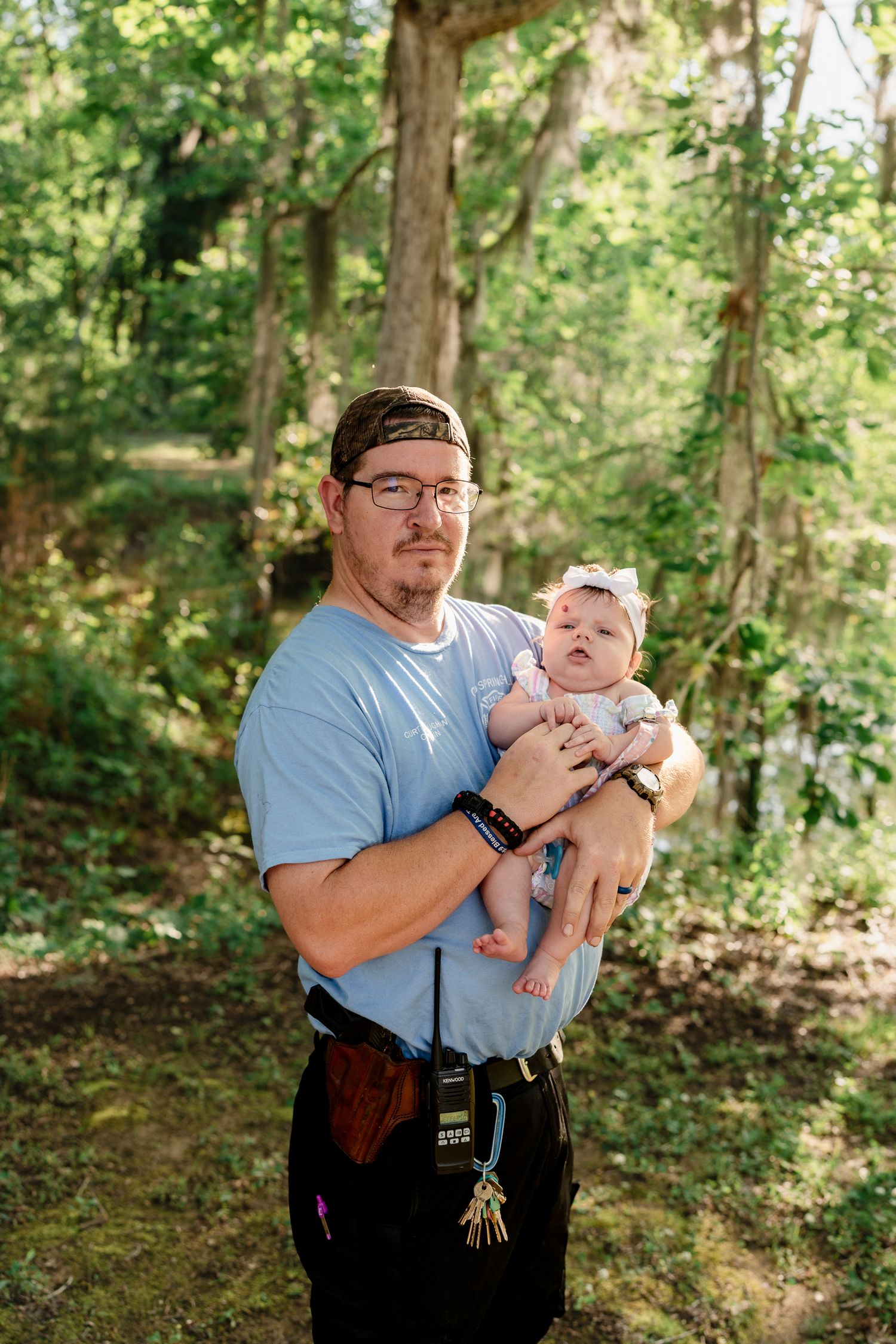 A series of tender moments captured between family members in a natural wooded setting.