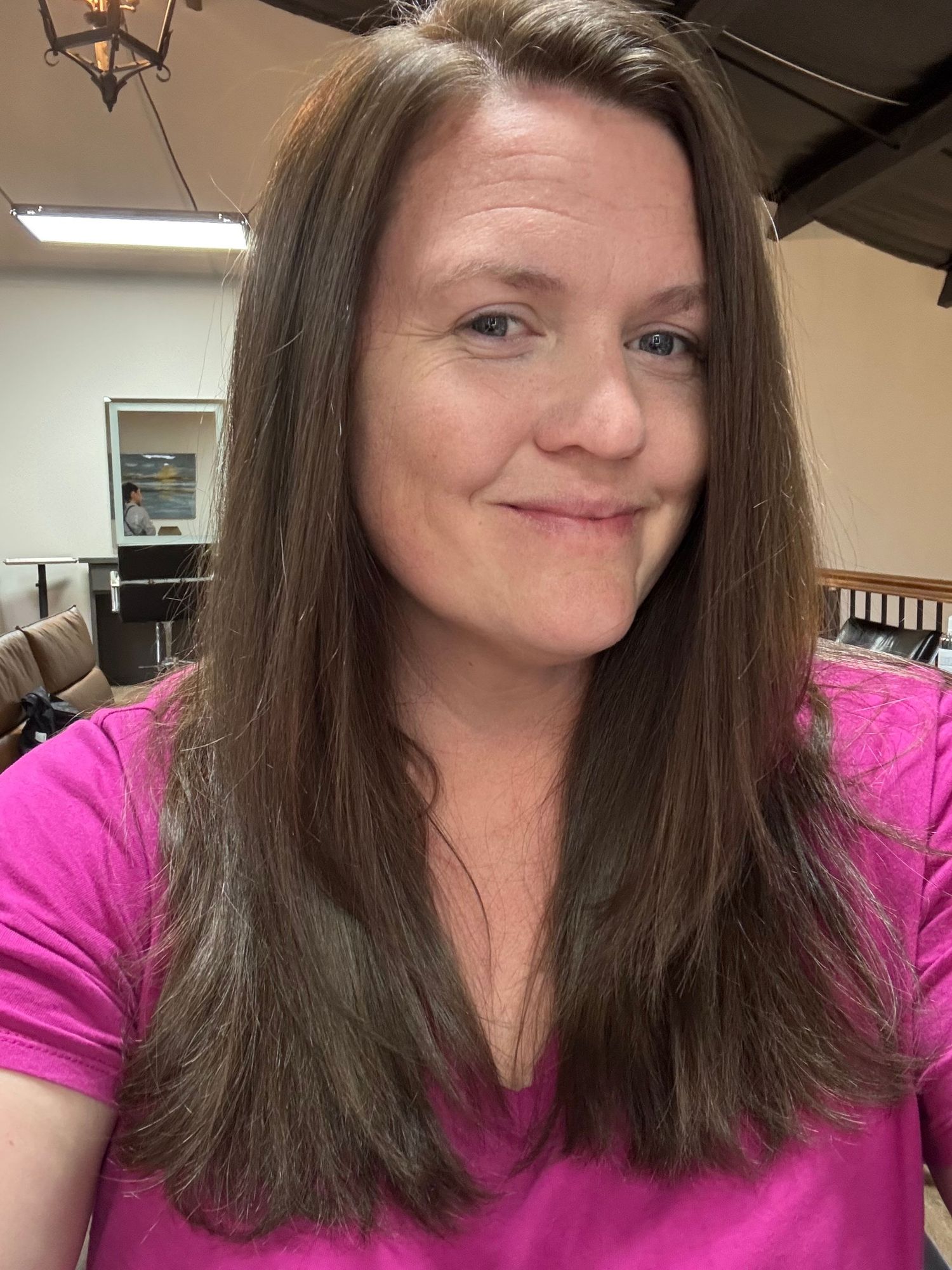 Casual self-portraits showing long brown hair and a bright pink shirt.