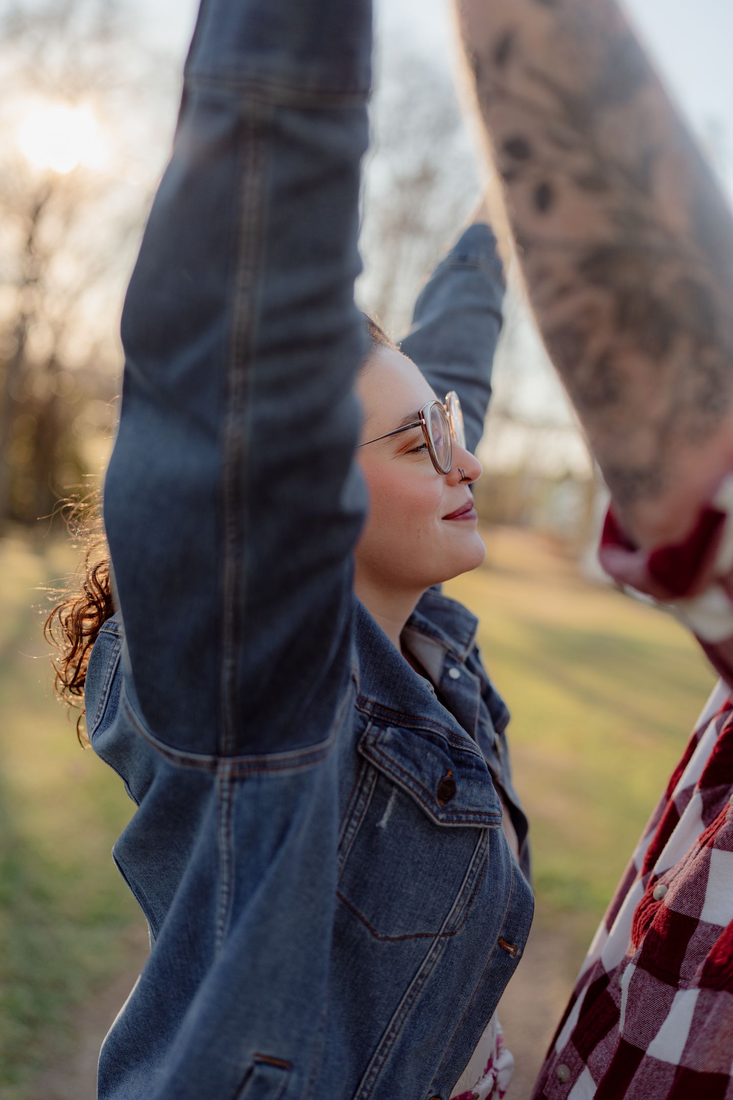 Close-up profile shots showing denim jacket and plaid shirt details against a natural outdoor background.