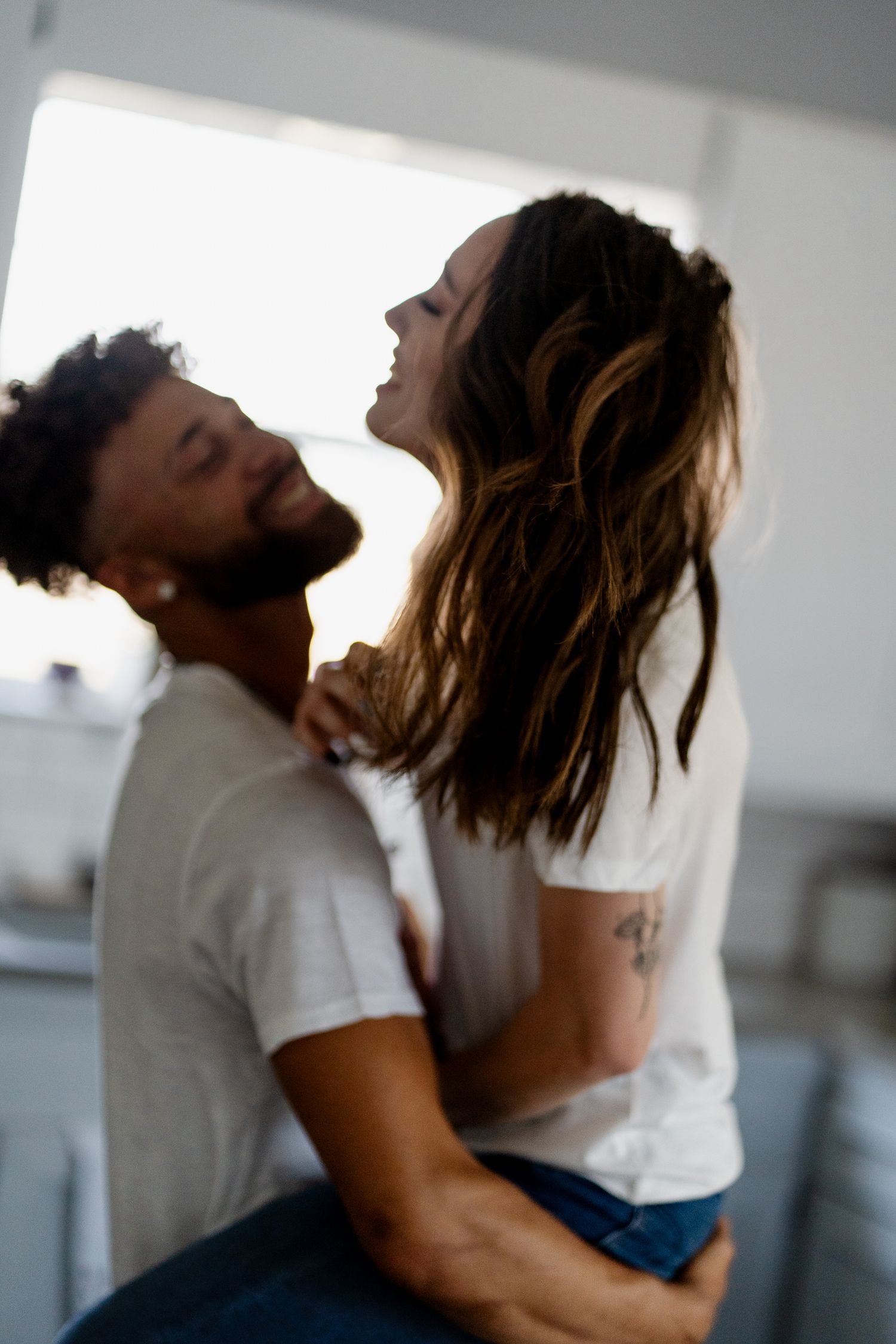 Artistic motion blur portrait series showing couple's passionate embrace.