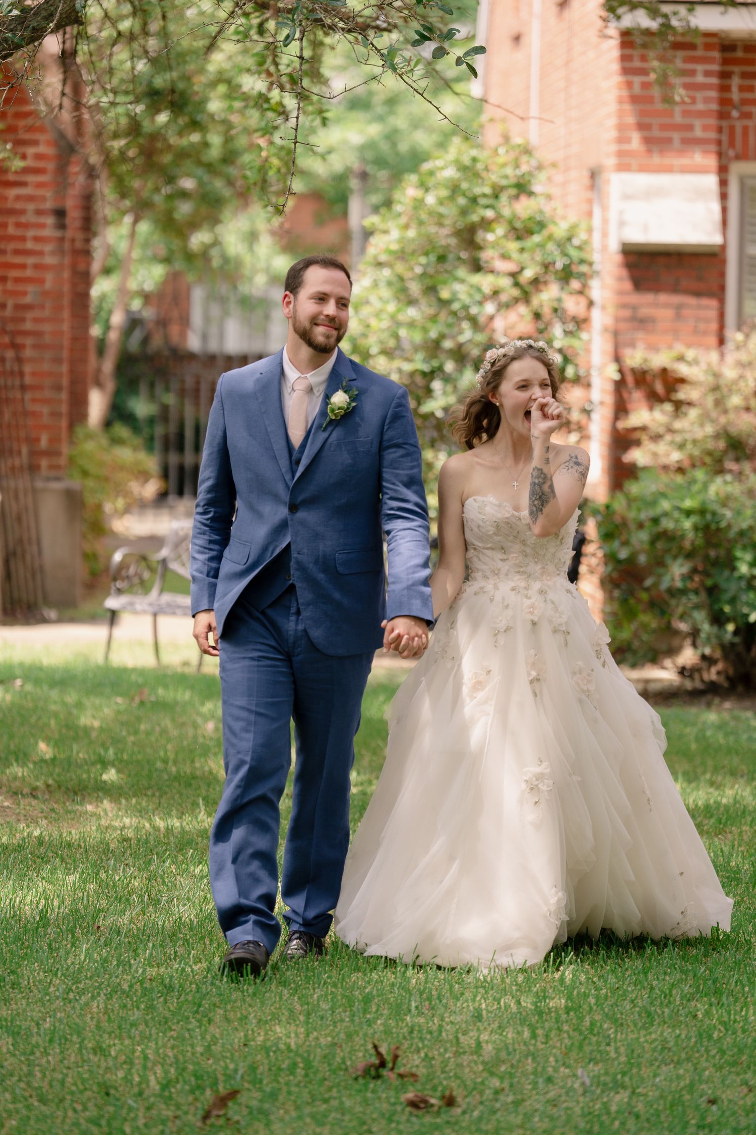 A playful wedding sequence shows a couple running and laughing together on a green lawn.