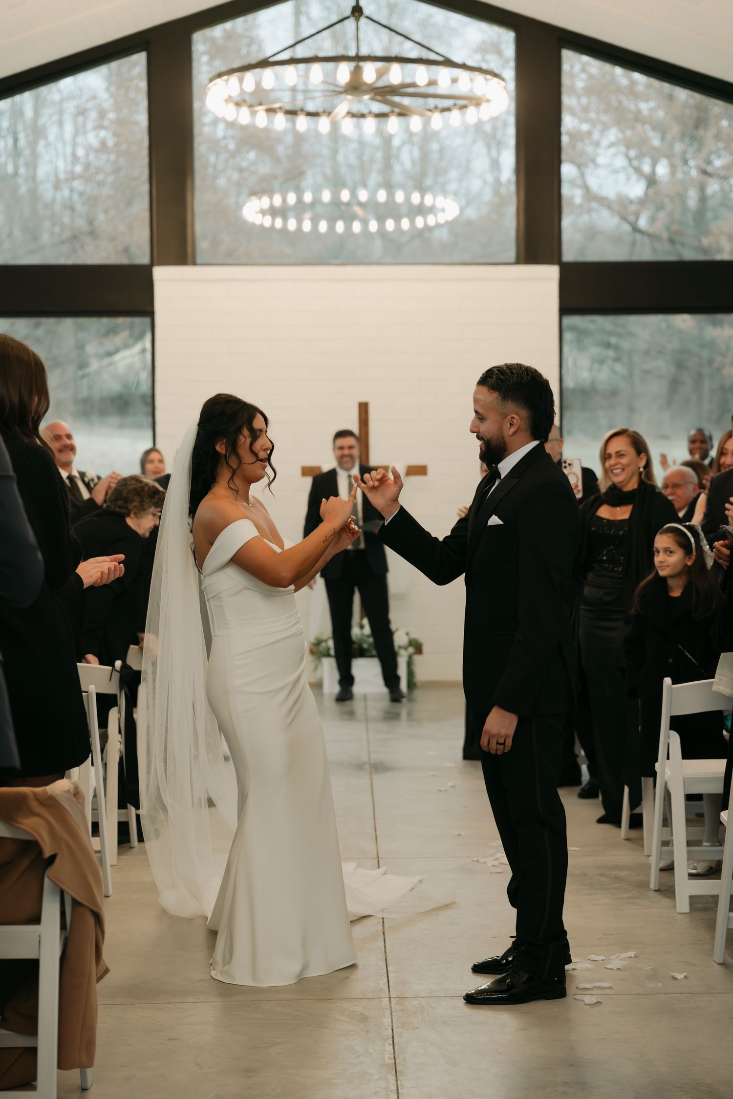 bride and groom doing their handshake