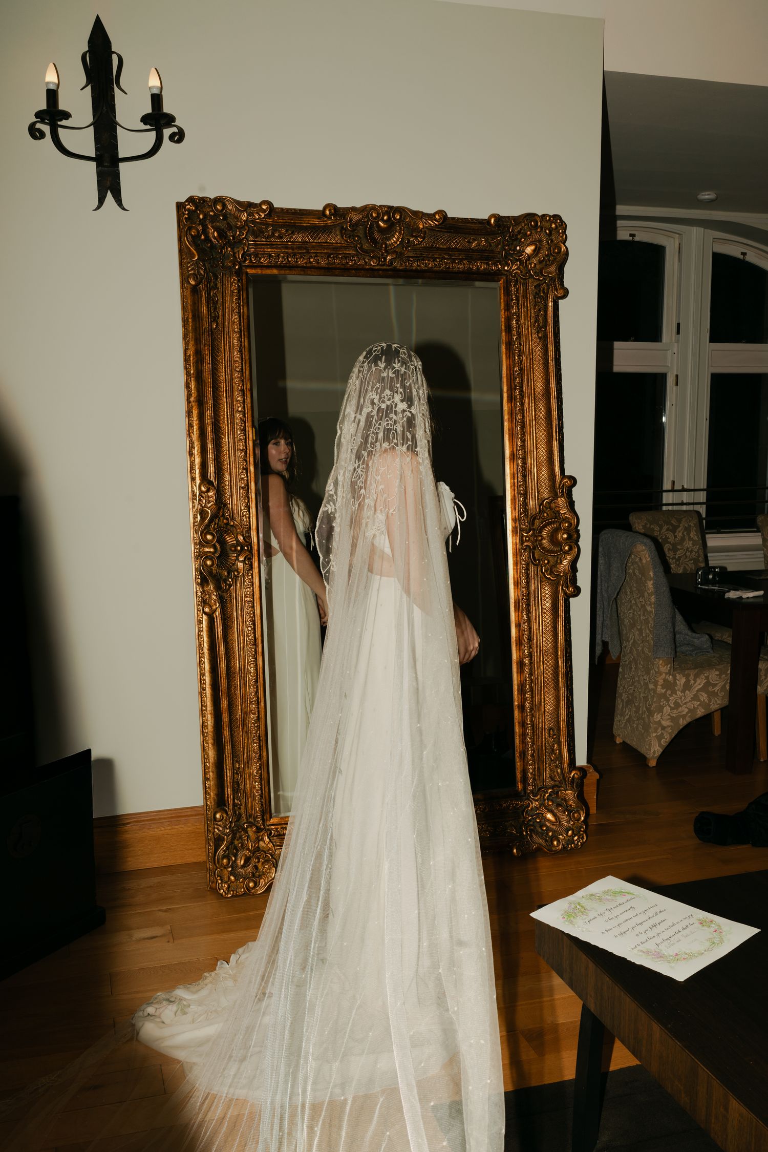 bridal portrait, looking into large mirror