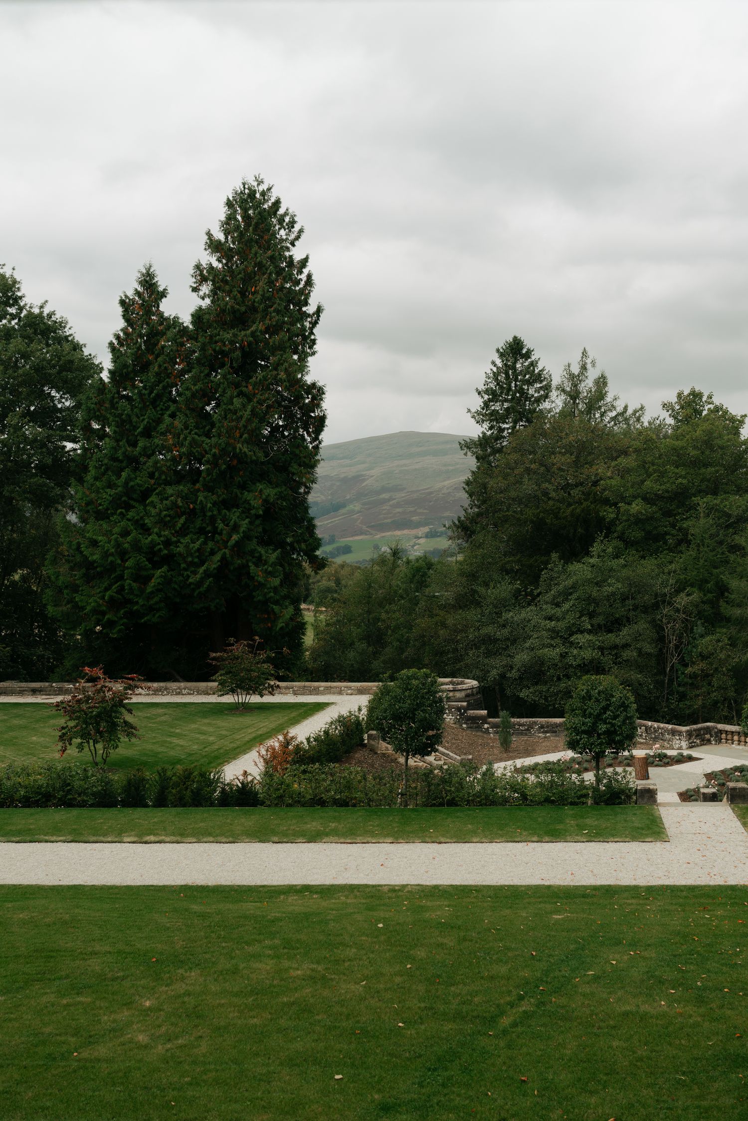 courtyard in Scotland at a castle with fall leaves on the ground